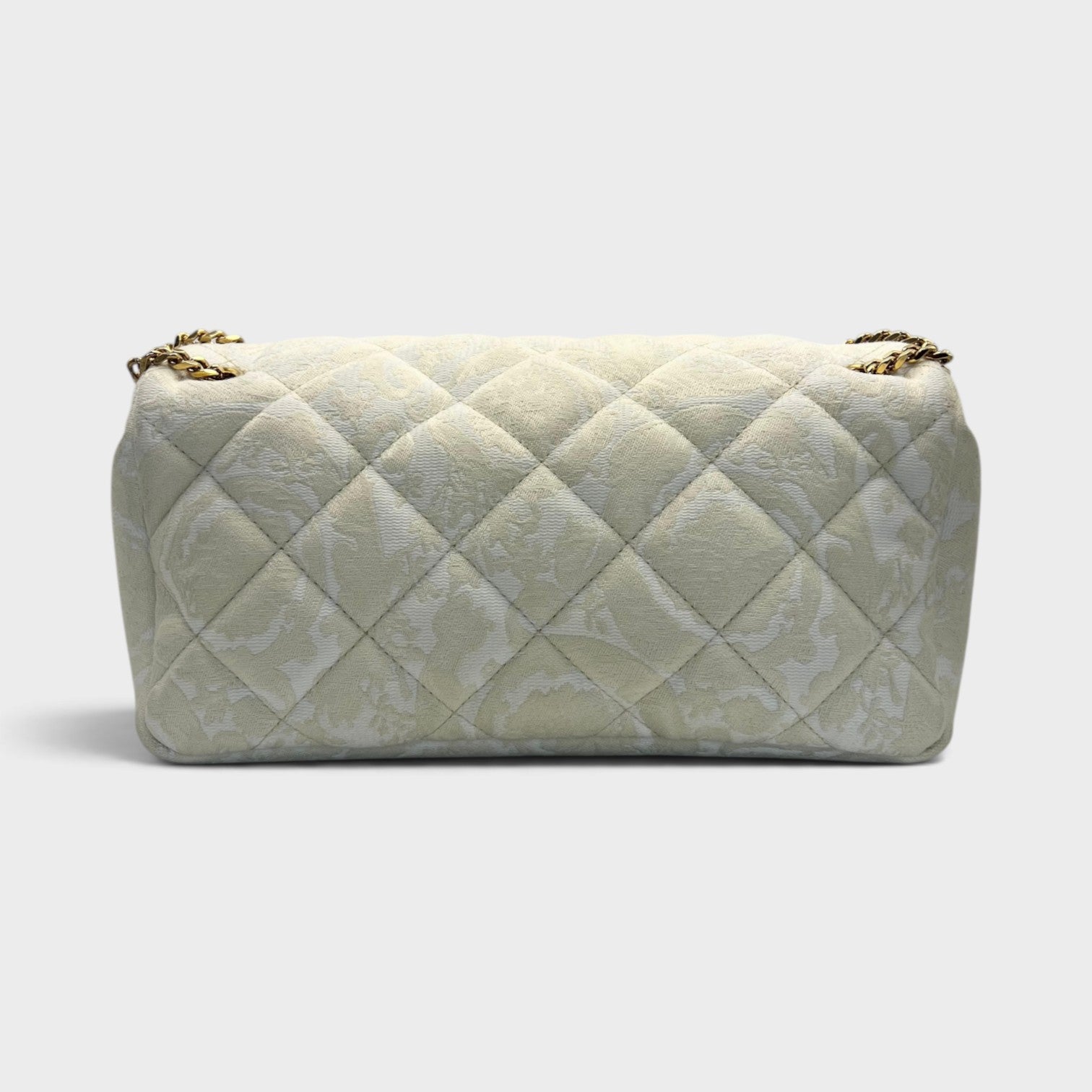 Supplied Fashion beige quilted shoulder bag with gold chain strap and subtle floral pattern