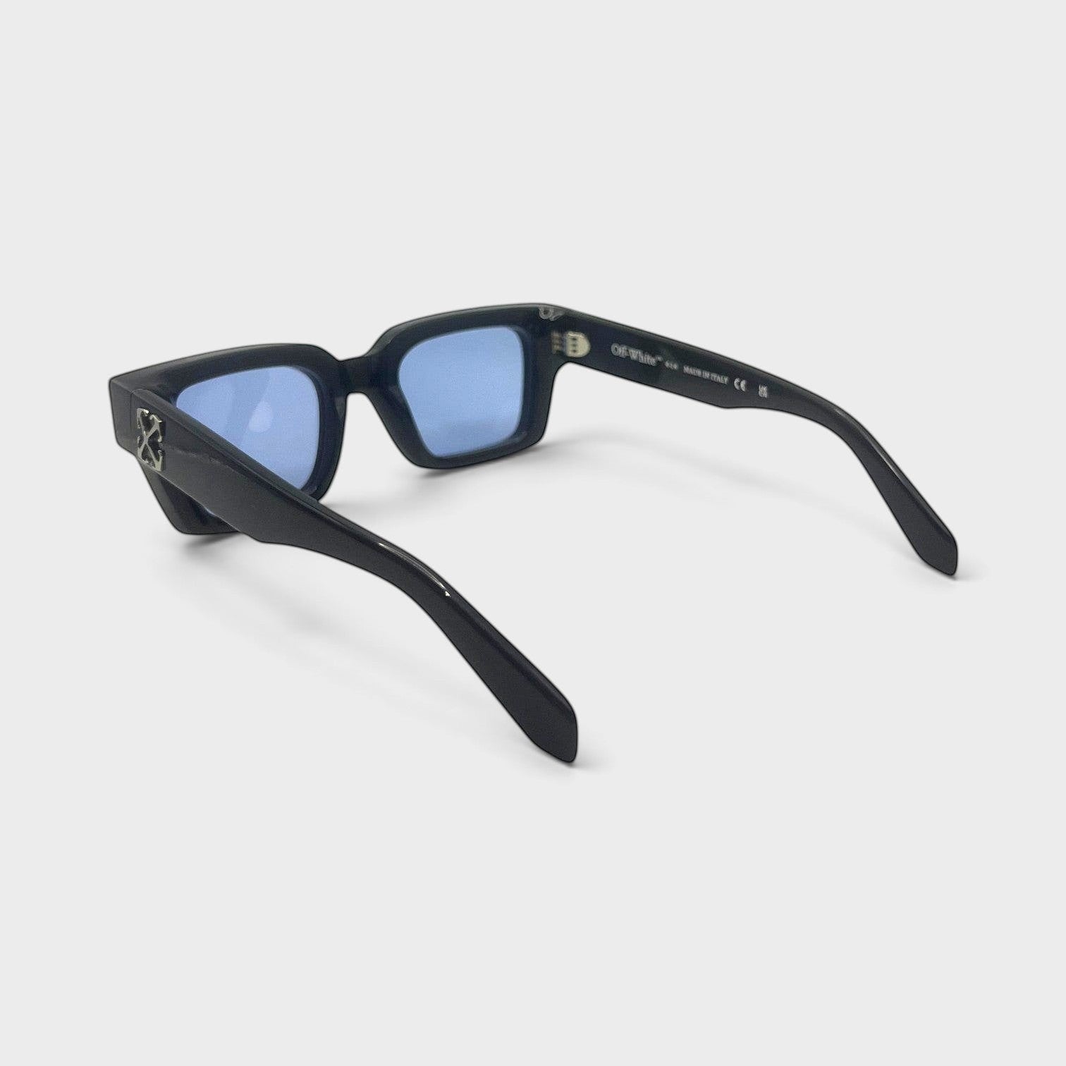 Supplied Fashion Virgil Arrows black acetate square sunglasses with blue tinted lenses and silver side logo detail