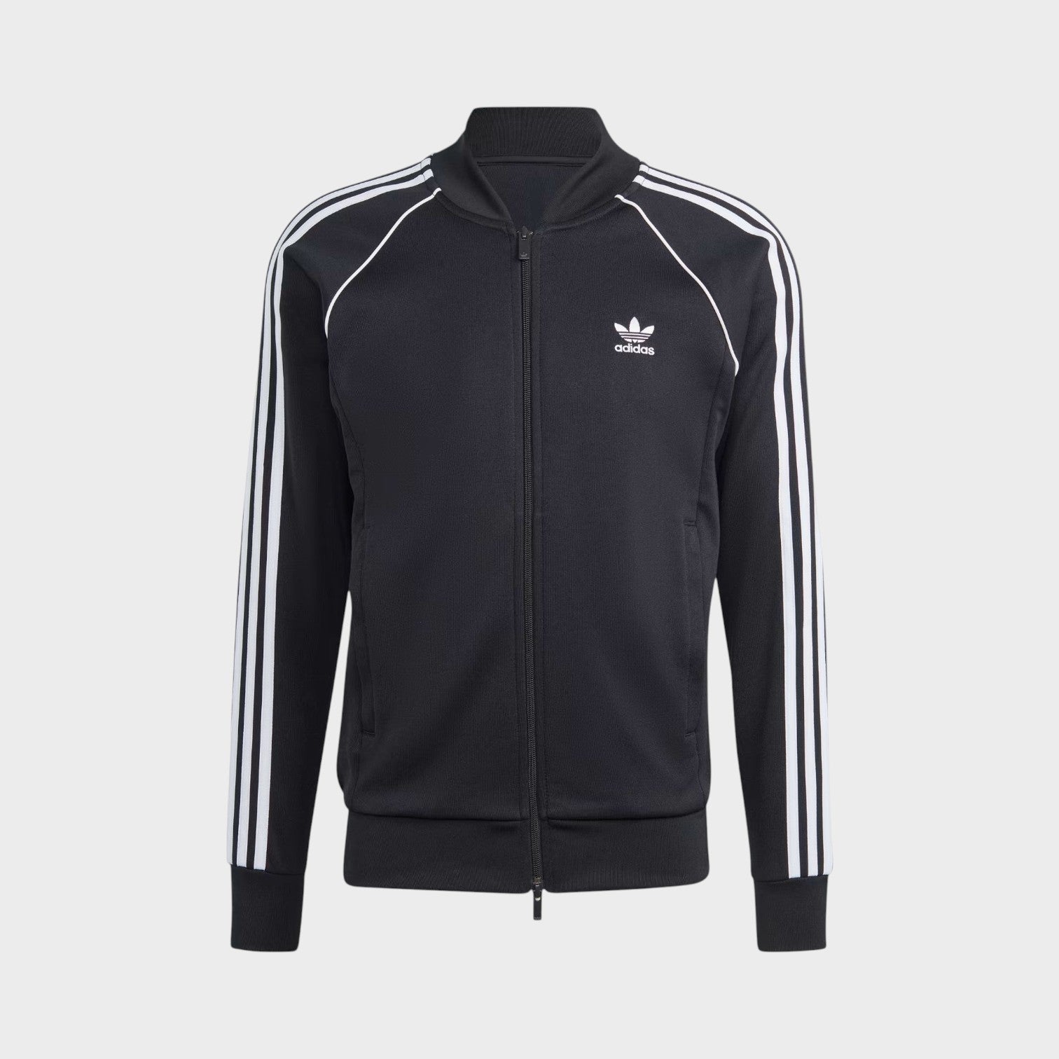 Supplied Fashion black adidas Adicolor Classics Superstar track top with white three-stripe sleeves and front zip.