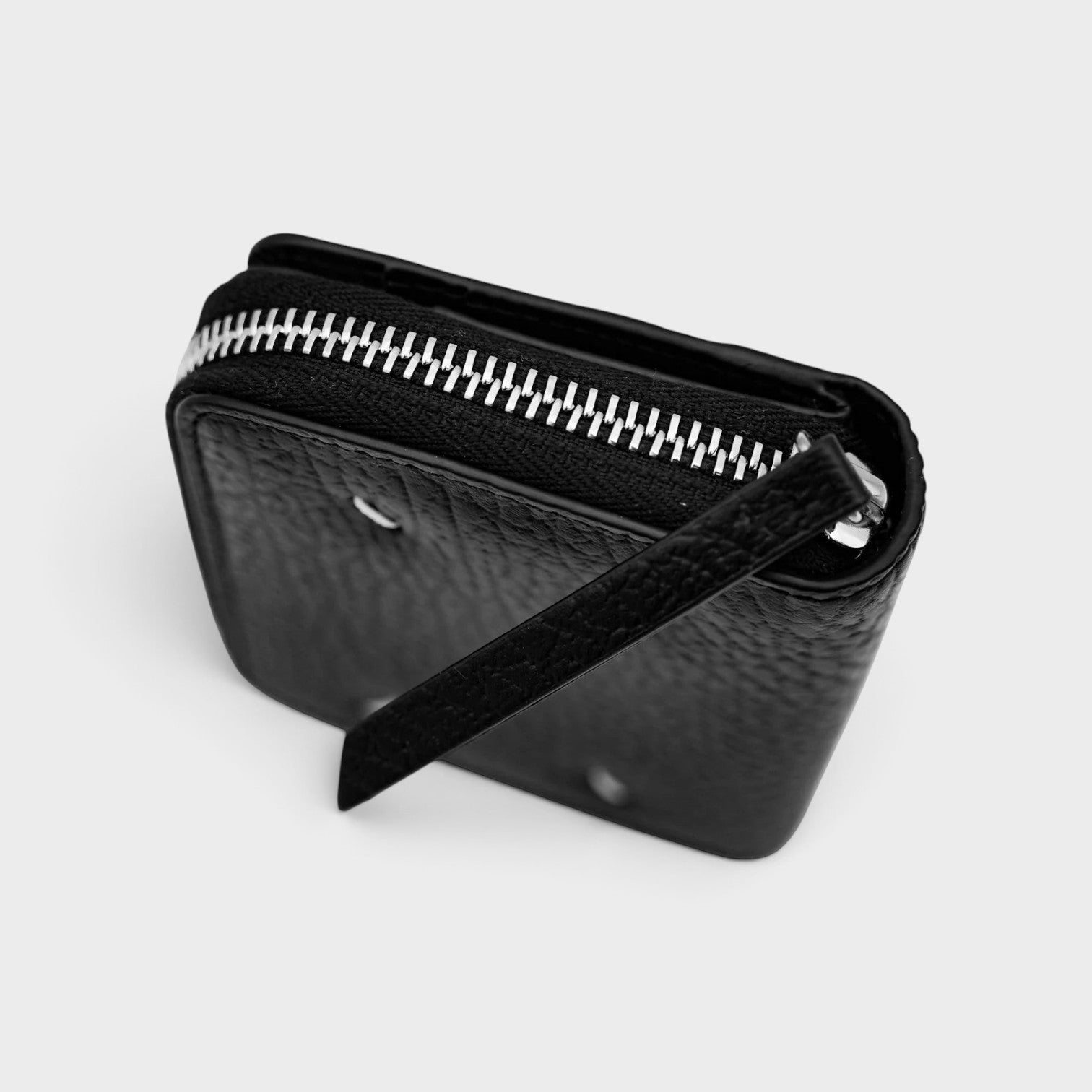 Supplied Fashion black leather coin pouch with signature four-stitch detail and silver zipper closure