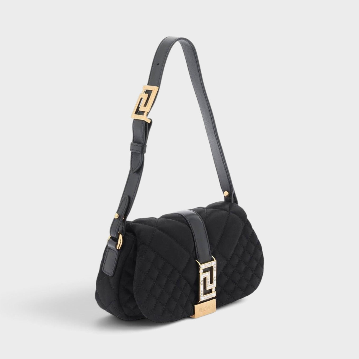 Supplied Fashion black quilted leather shoulder bag with gold Greca motif hardware and adjustable strap.