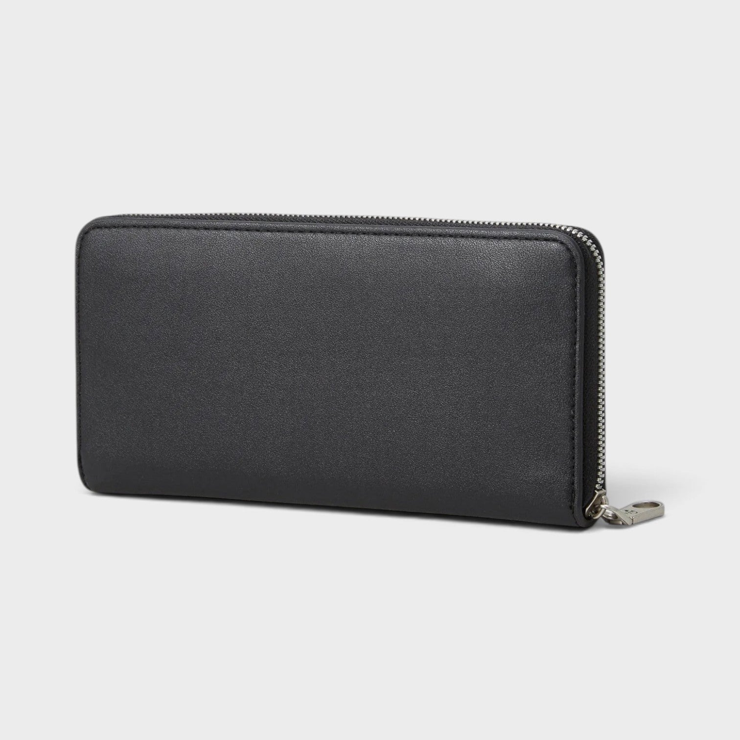 Supplied Fashion black sculpted zip-around wallet with a sleek minimalist design and secure silver zipper closure.