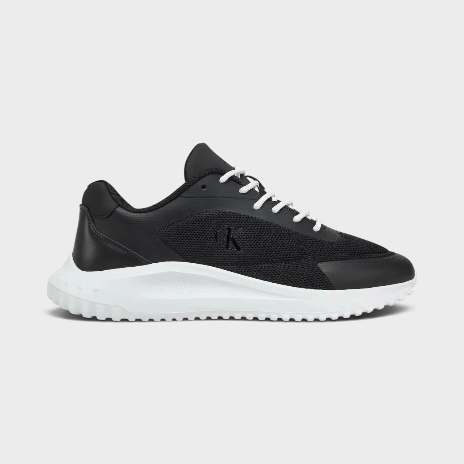 Supplied Fashion Calvin Klein Eva Runner low-top black mesh and leather sneakers with a white responsive sole