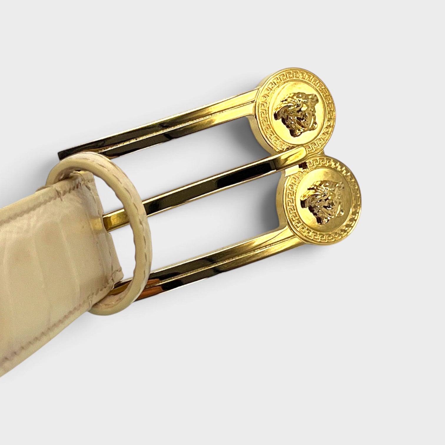 Supplied Fashion cream embossed crocodile leather belt featuring a gold-tone double Medusa head buckle