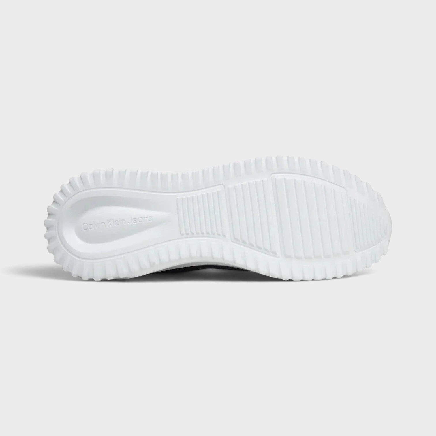 Supplied Fashion Eva Runner Low sneaker white rubber outsole with textured grip and Calvin Klein branding