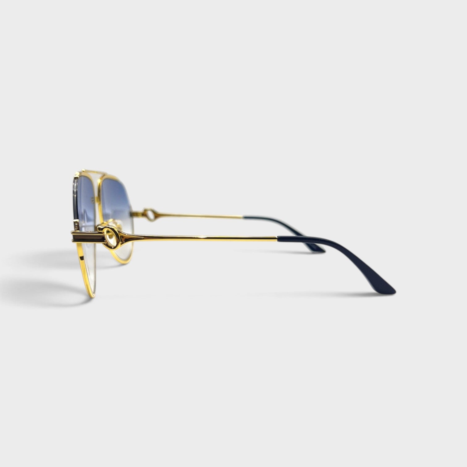 Supplied Fashion stainless steel aviator sunglasses with gold frames and midnight blue gradient lenses, side view.