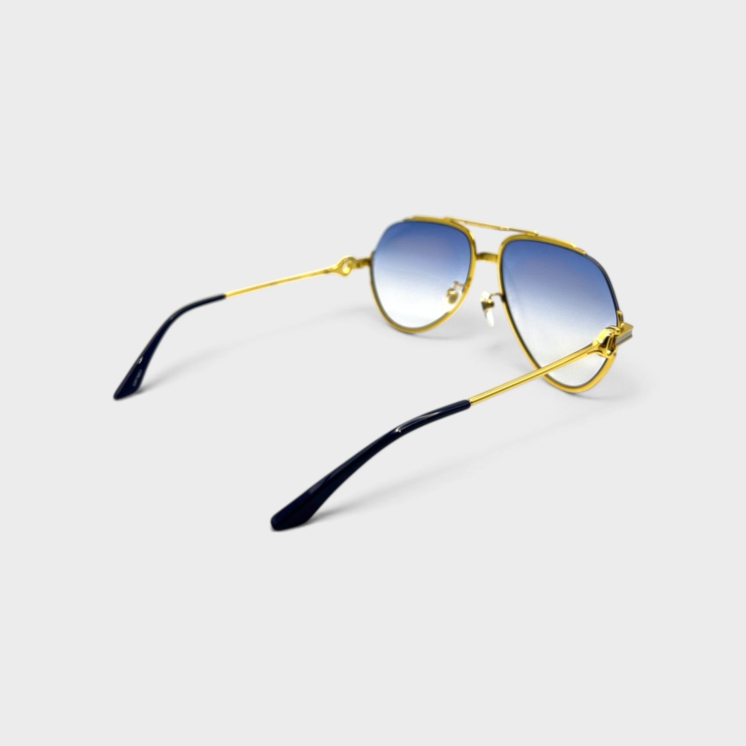 Supplied Fashion stainless steel aviator sunglasses with gold frames and midnight blue gradient lenses, rear view.