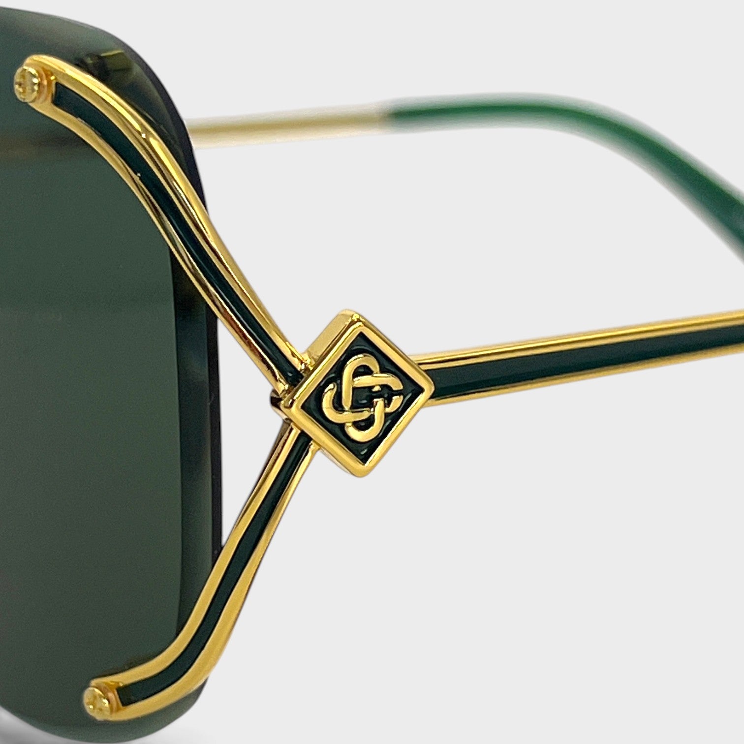 Supplied Fashion stainless steel aviator sunglasses featuring yellow gold frames, green lenses, and logo detail.