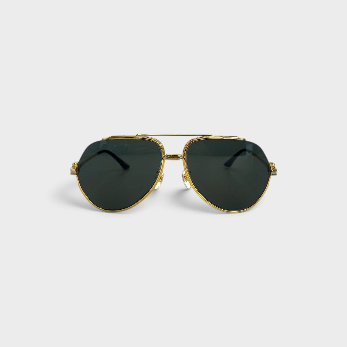 Supplied Fashion rounded frame sunglasses with gold metal rims and black lenses, featuring a classic aviator style.