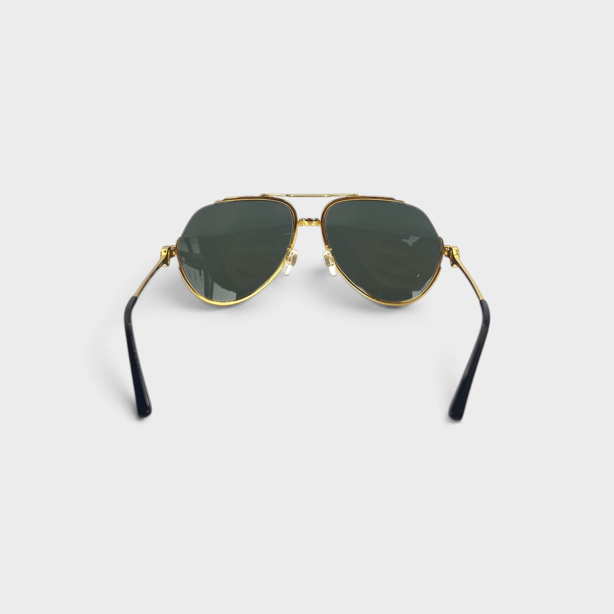 Supplied Fashion rounded frame sunglasses with gold metal rims, black temple tips, and dark UV-protective lenses.