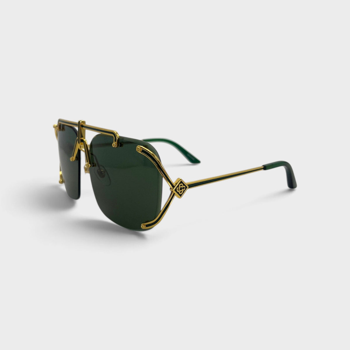 Supplied Fashion stainless steel aviator sunglasses in yellow gold with green lenses and decorative side emblems.