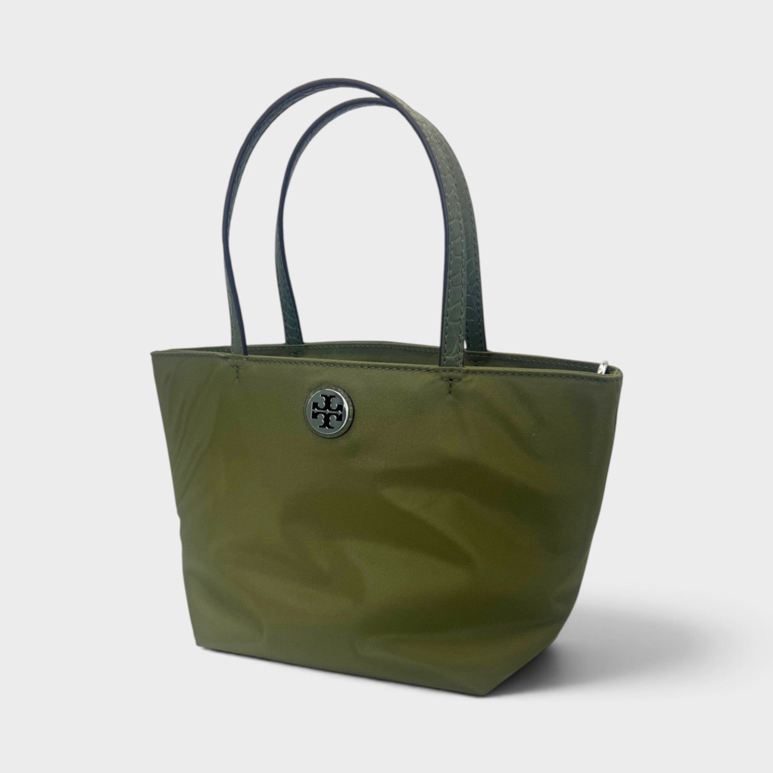 Supplied Fashion Tory Burch green khaki nylon mini tote bag with textured handles and silver logo emblem