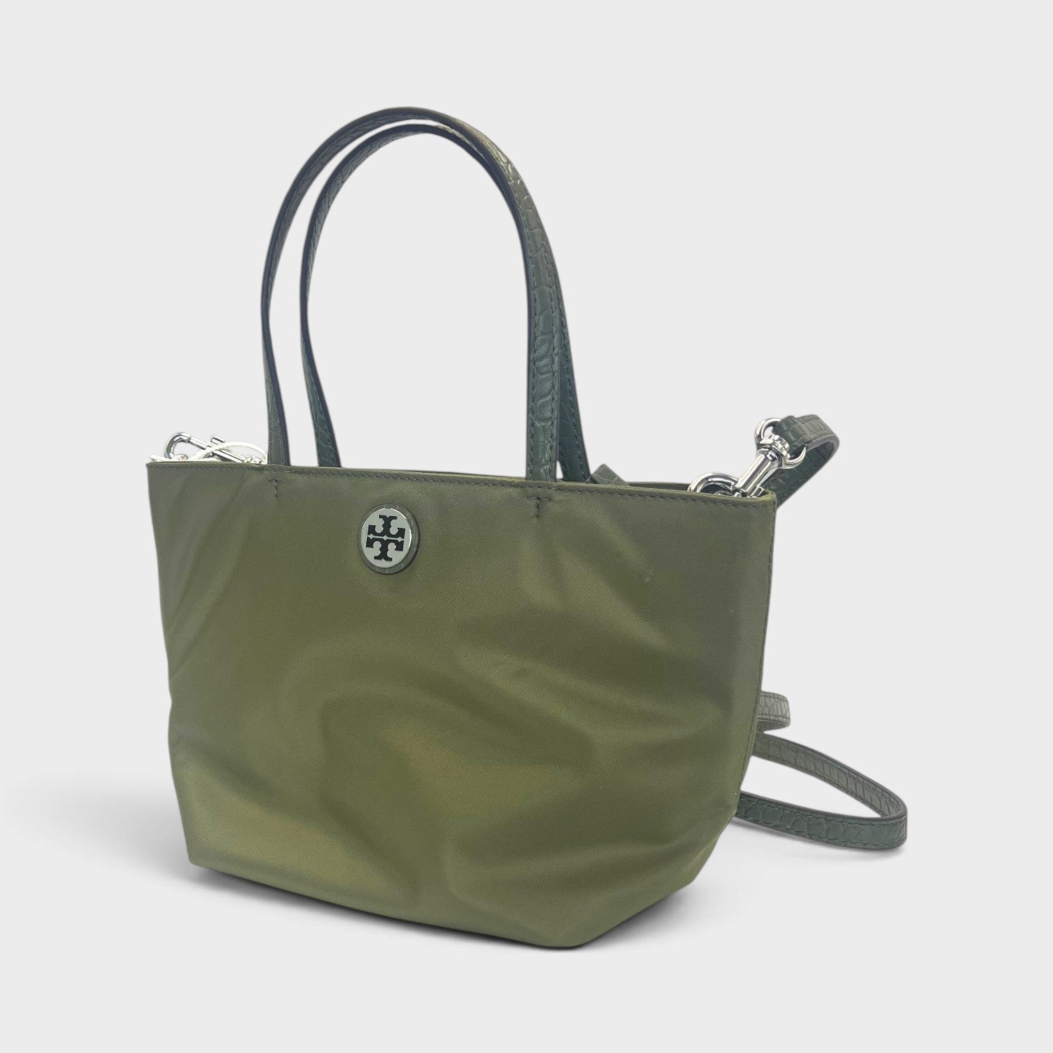 Supplied Fashion Tory Burch green khaki nylon mini tote bag with textured leather handles and silver logo hardware