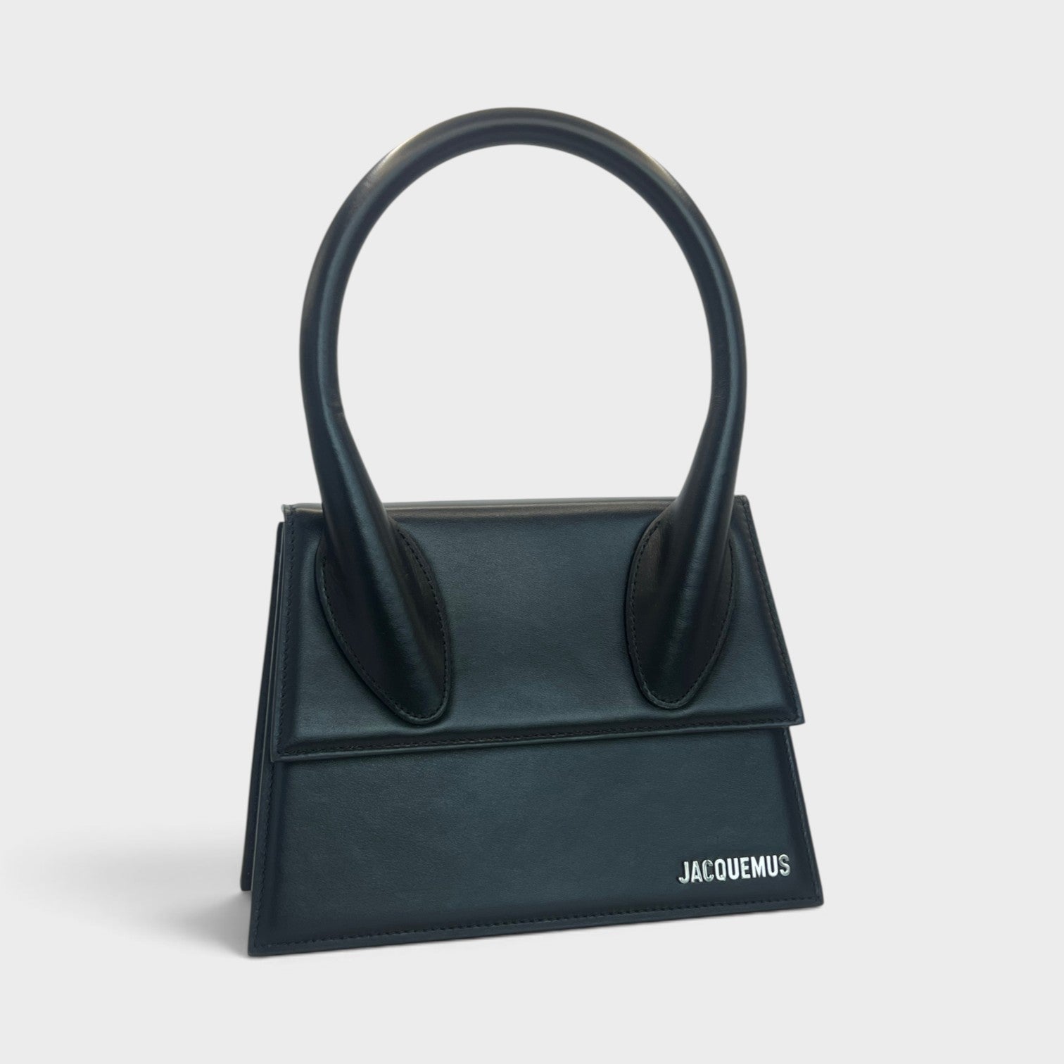 Supplied Fashion Jacquemus Le Grand Chiquito black structured handbag with silver logo and top handle