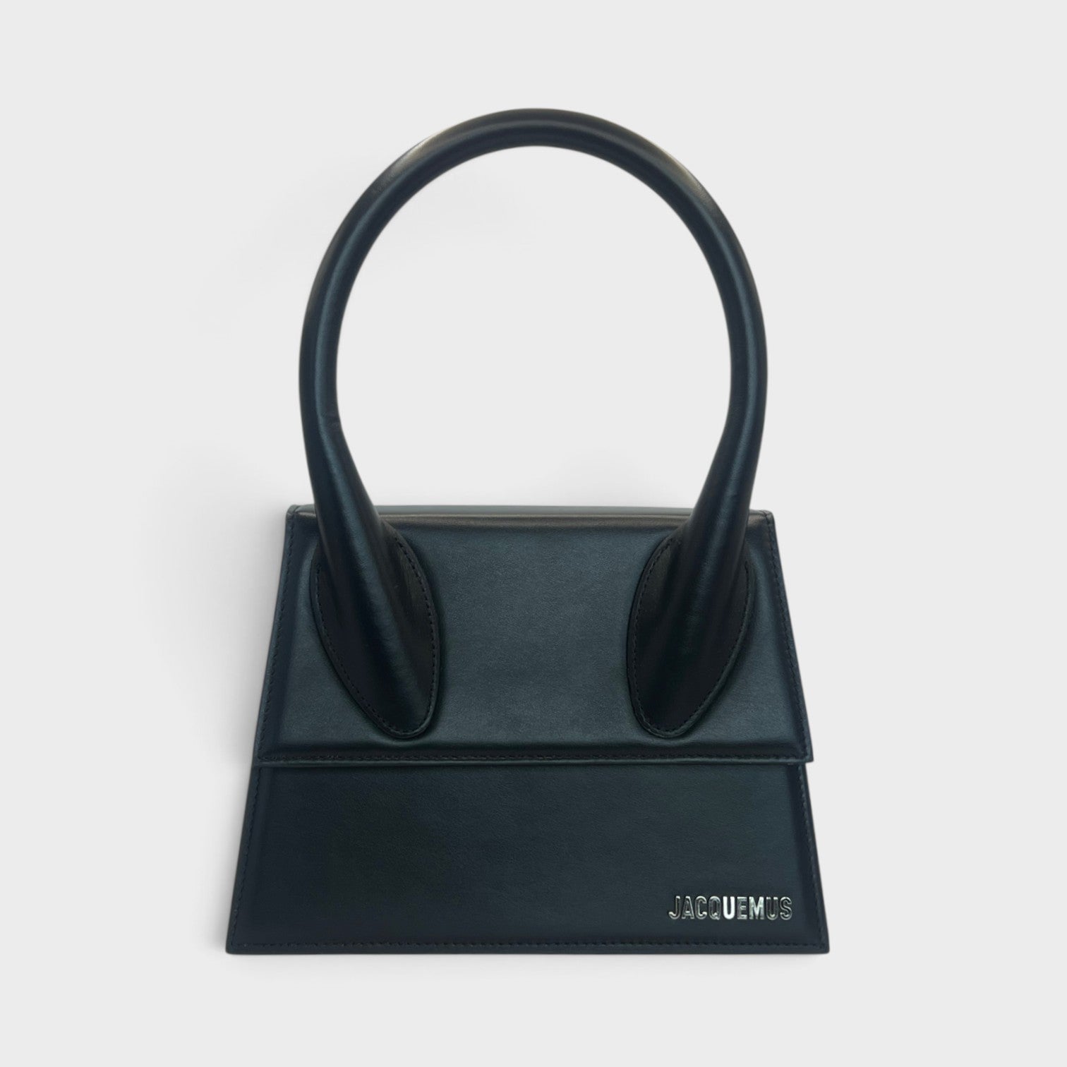 Supplied Fashion Jacquemus Le Grand Chiquito black leather handbag with silver-tone logo and structured top handle.