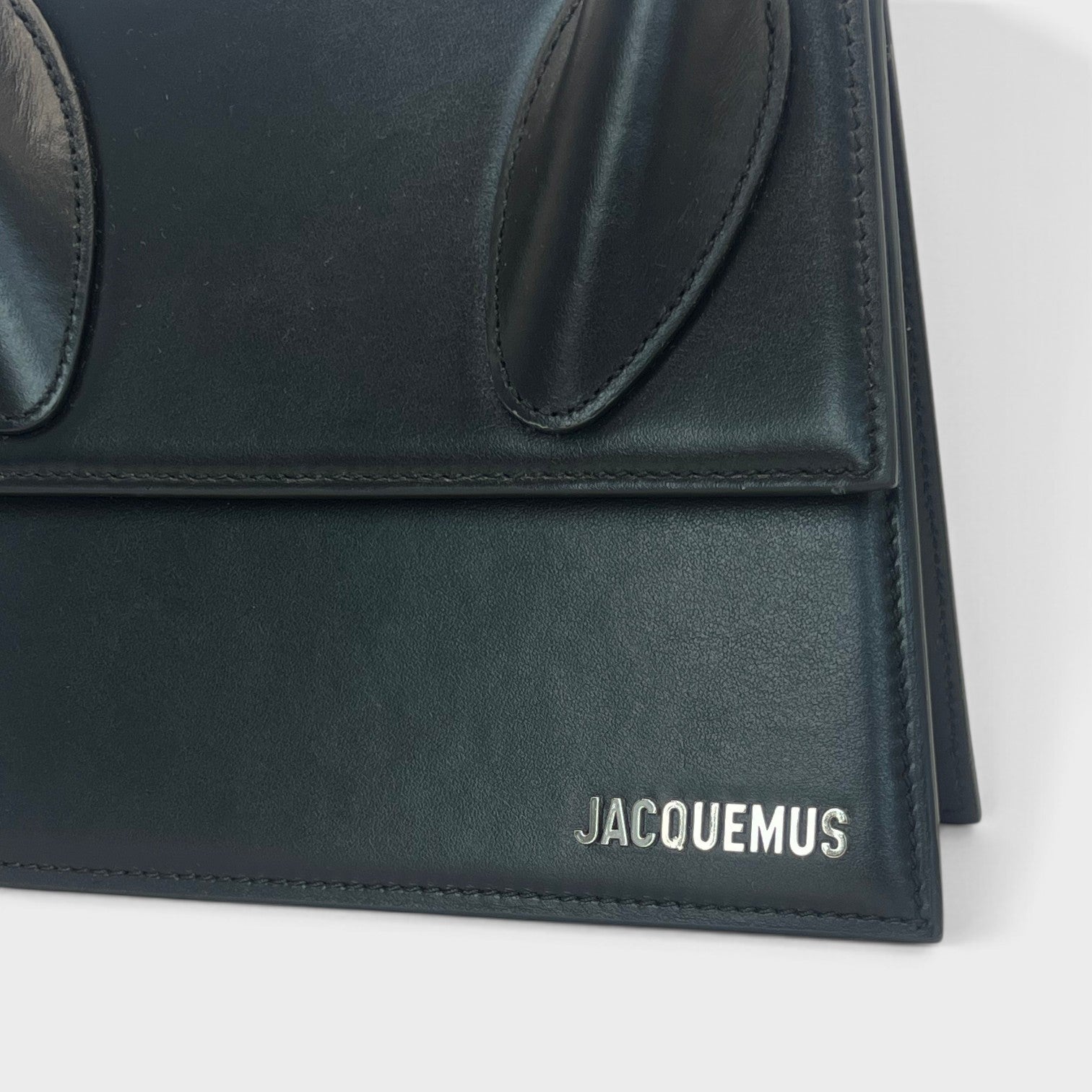 Supplied Fashion Jacquemus Le Grand Chiquito black leather handbag with silver logo and structured silhouette