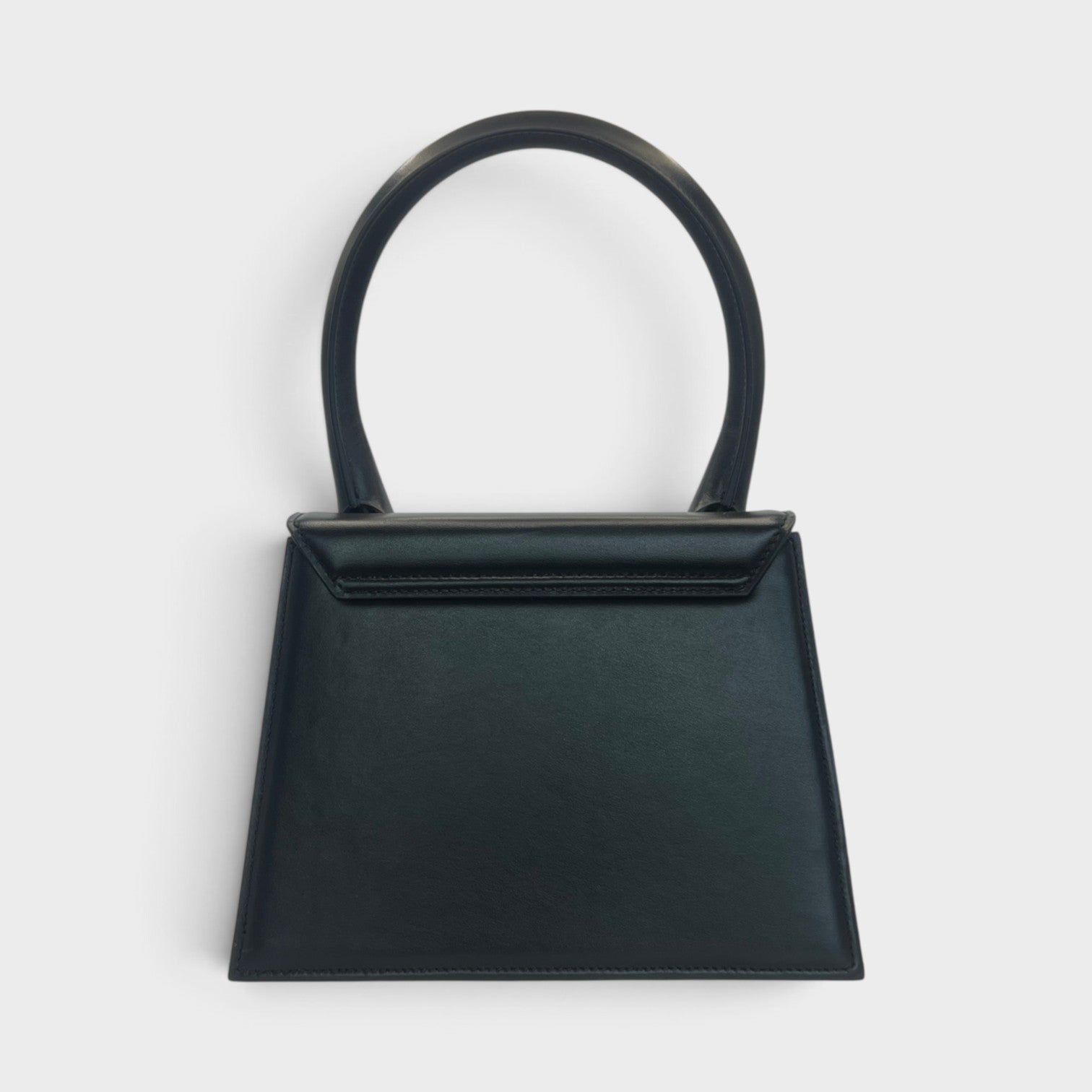 Supplied Fashion Jacquemus Le Grand Chiquito black leather handbag with a structured silhouette and top handle