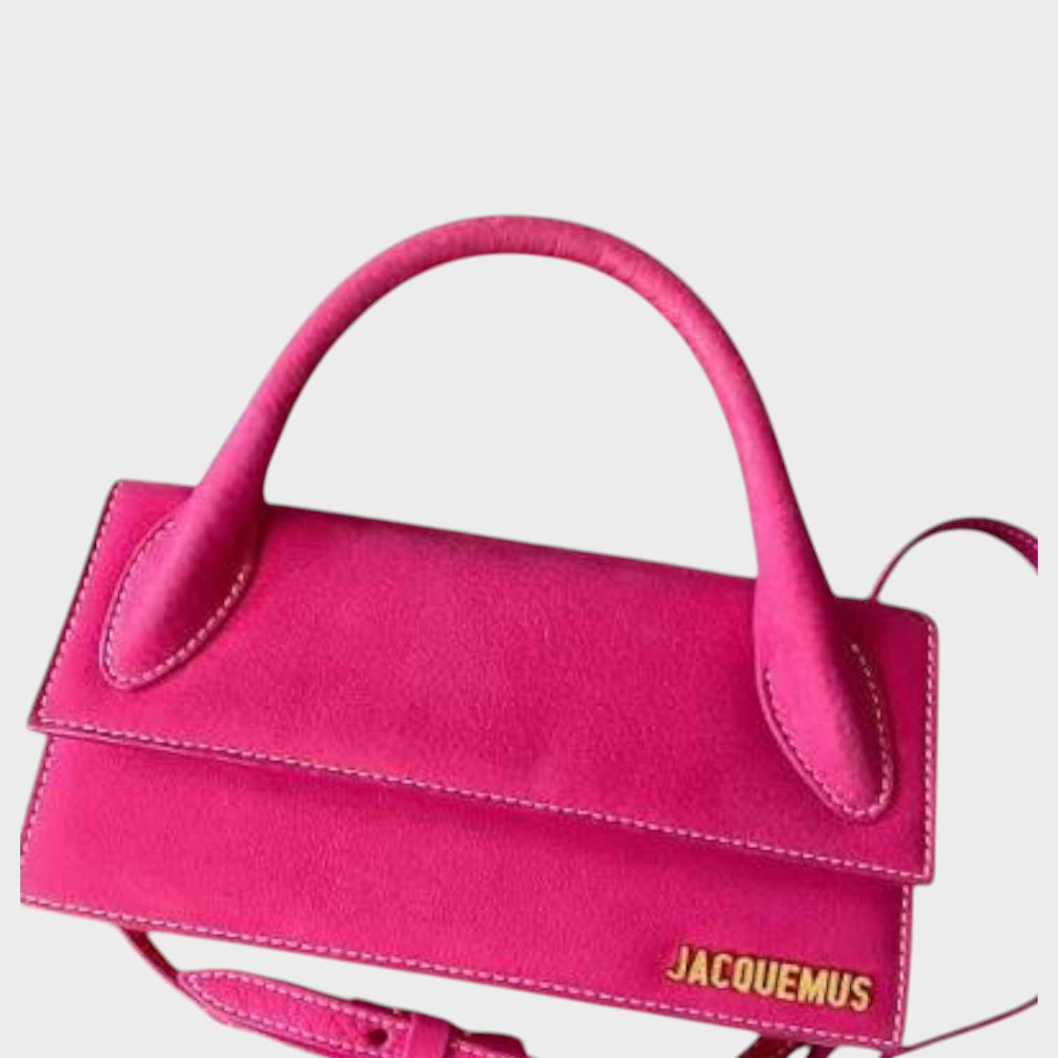Supplied Fashion Jacquemus Le Chiquito Long bag in vibrant fuchsia pink with gold logo and structured top handle.