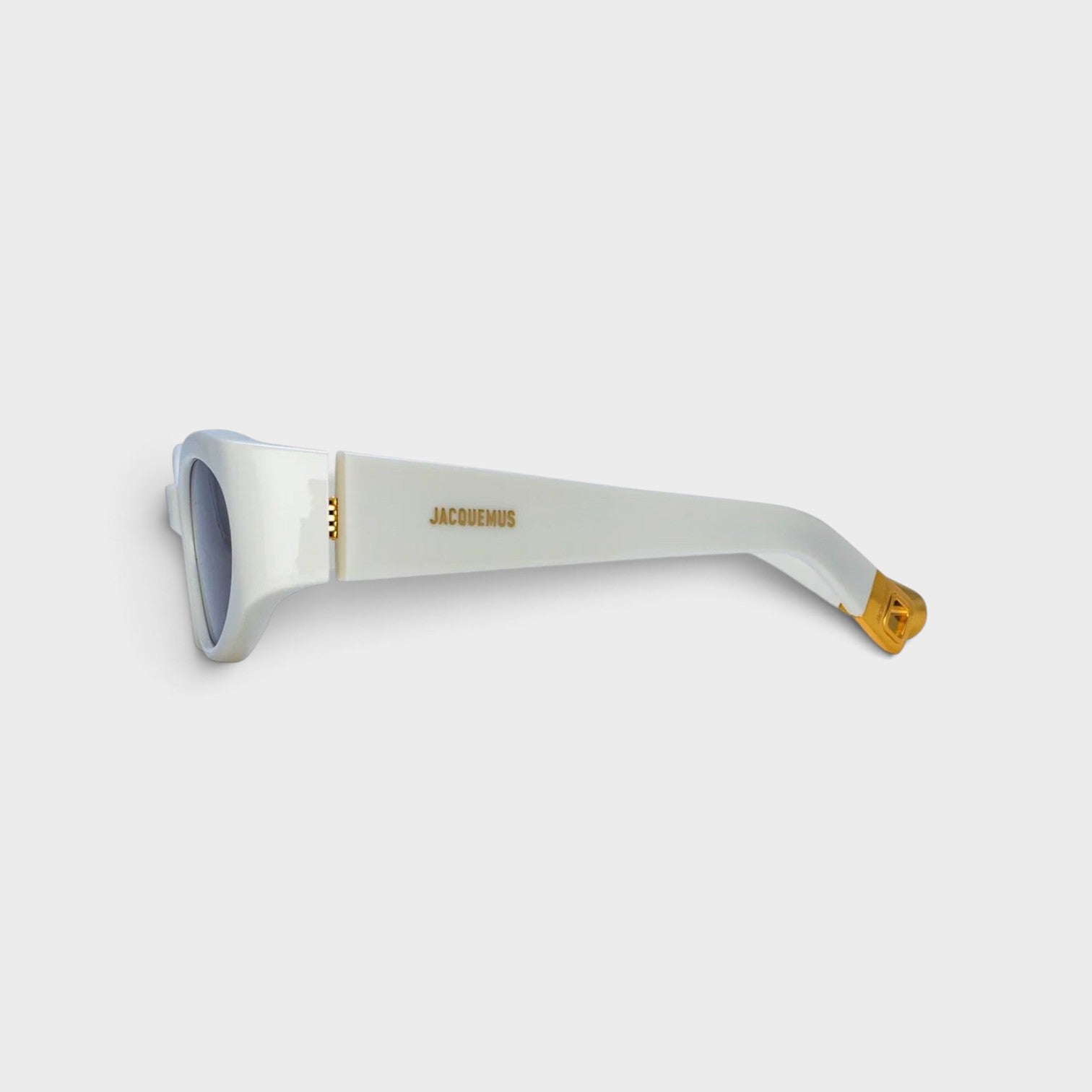 Supplied Fashion Jacquemus x Linda Farrow Ovalo oval sunglasses in white with gold logo and temple tip detail