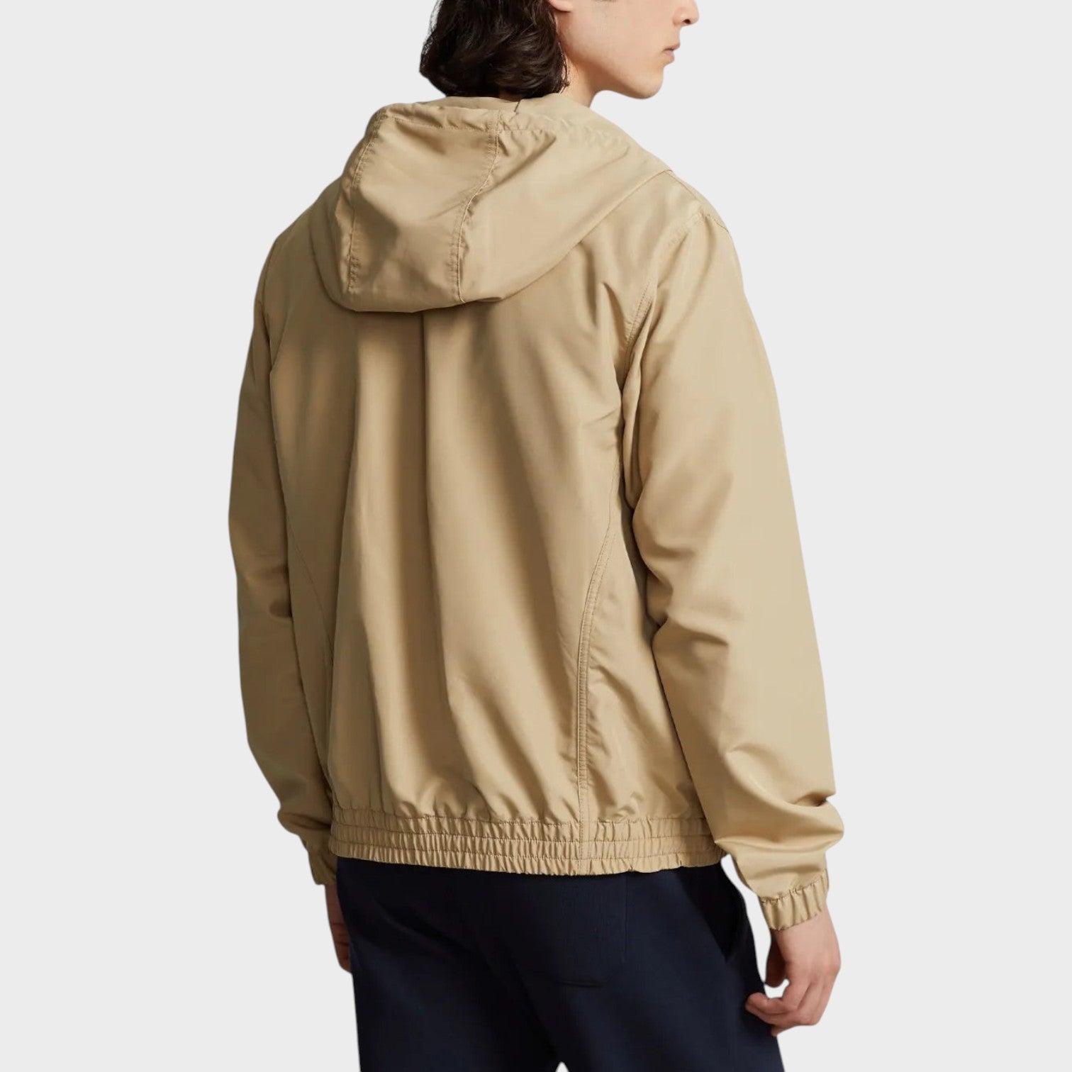 Supplied Fashion khaki hooded jacket with elasticated cuffs and hem, shown from the back on a model