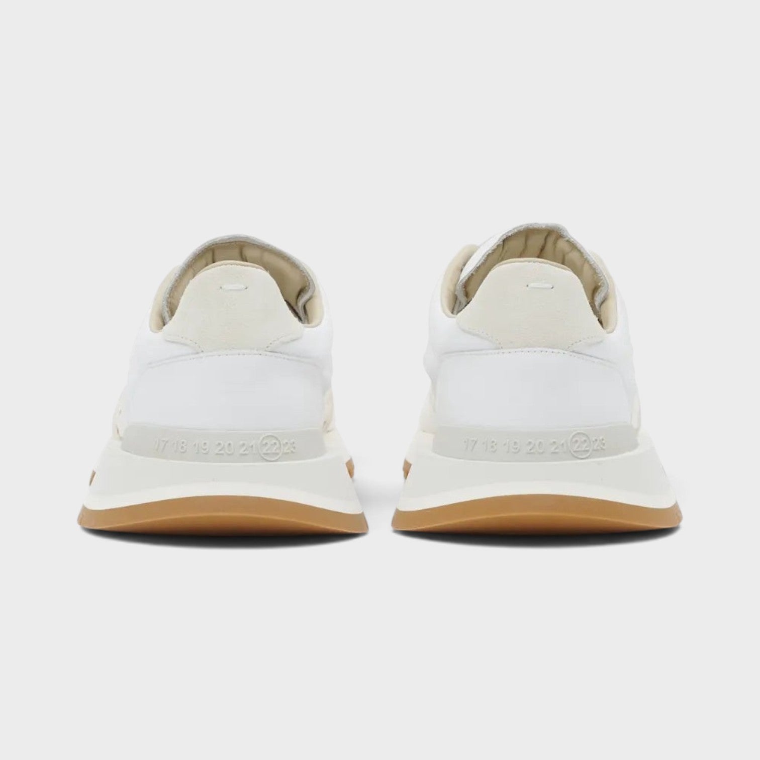 Supplied Fashion Maison Margiela 50-50 white leather sneakers showing the back view with split-sole construction