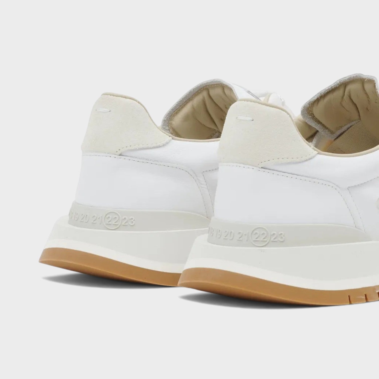 Supplied Fashion Maison Margiela 50-50 white leather sneakers with signature split-sole and numeric heel detail