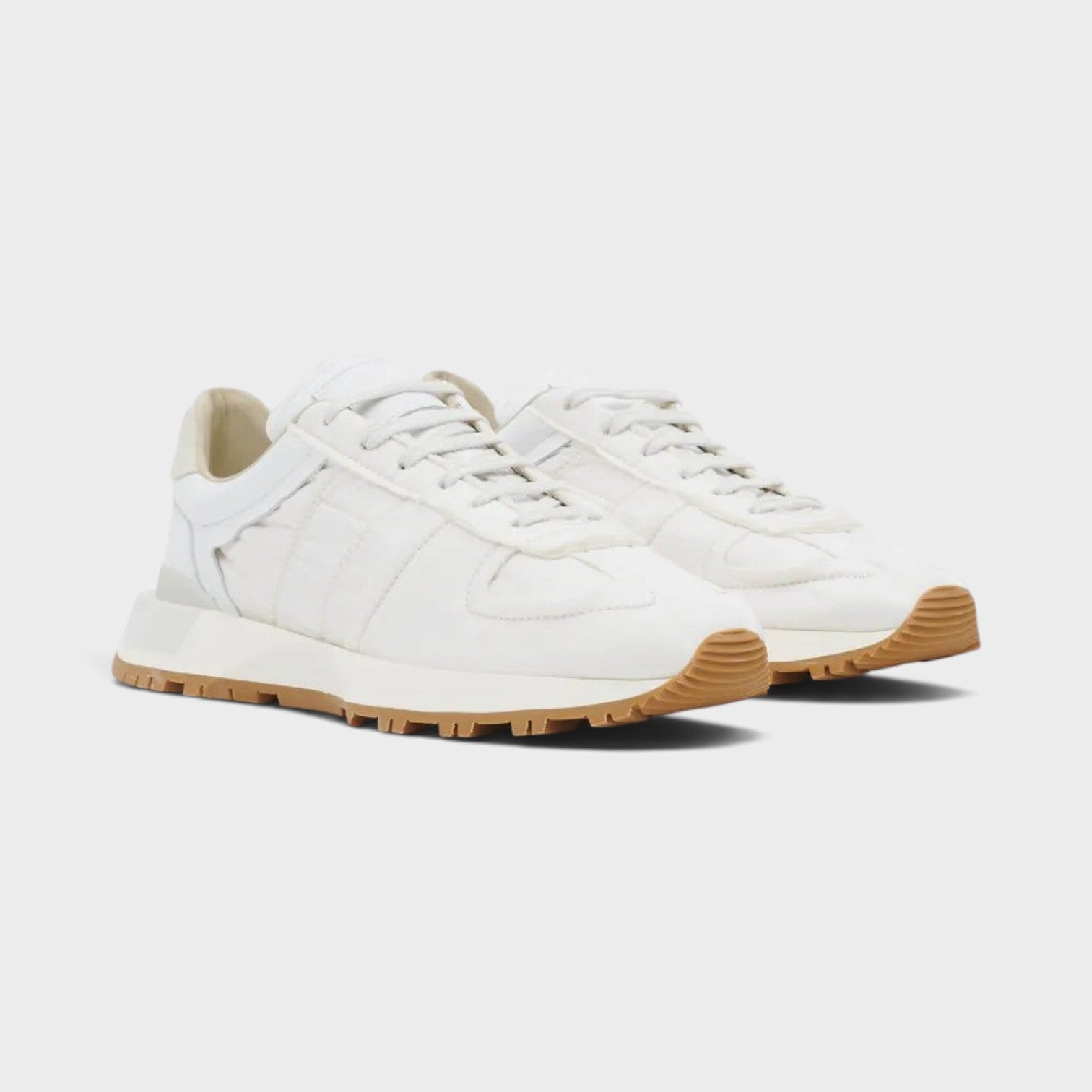 Supplied Fashion Maison Margiela 50-50 white leather sneakers with signature deconstructed split-sole design.