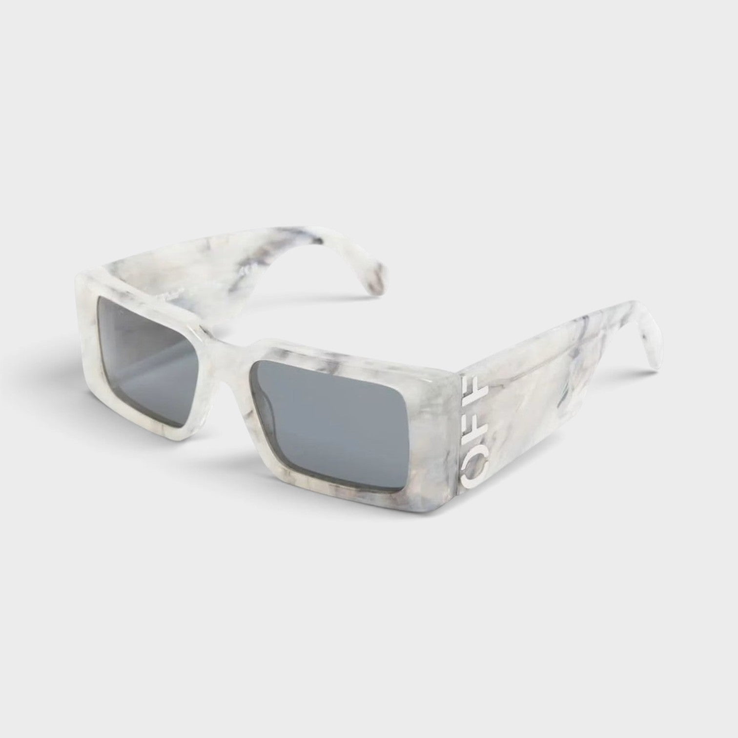 Supplied Fashion Milano sunglasses in marble dark grey with off-white accents and rectangular frames.