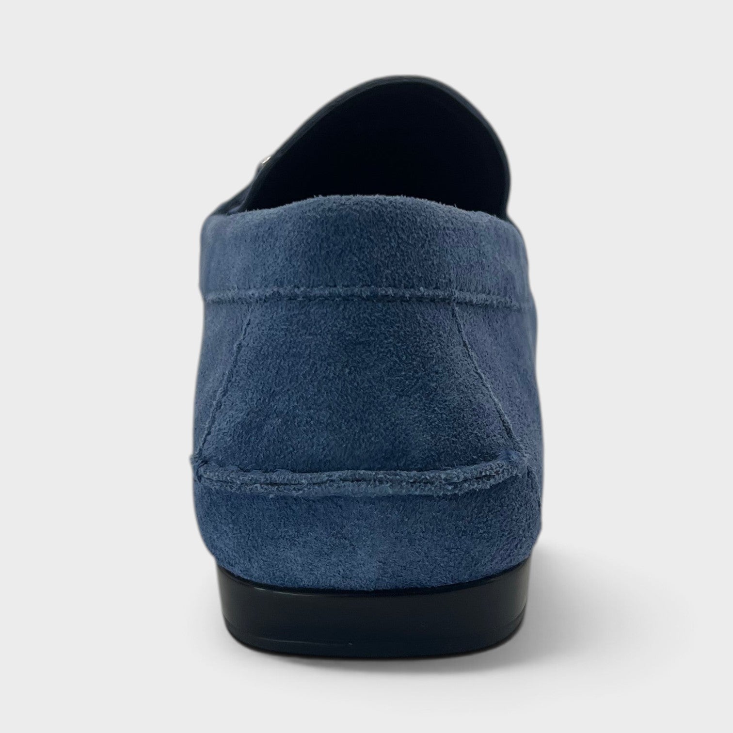 Supplied Fashion Medusa Greca driver loafer in dark stone navy suede, back view showing the slip-on silhouette.
