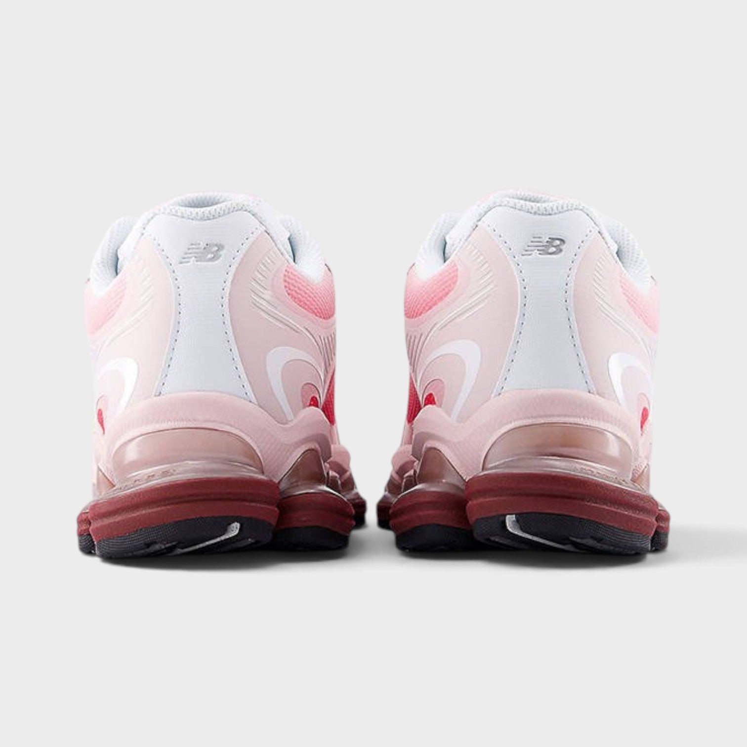 Supplied Fashion New Balance Abzorb 2000 sneakers in pink showing the rear view with cushioned midsoles