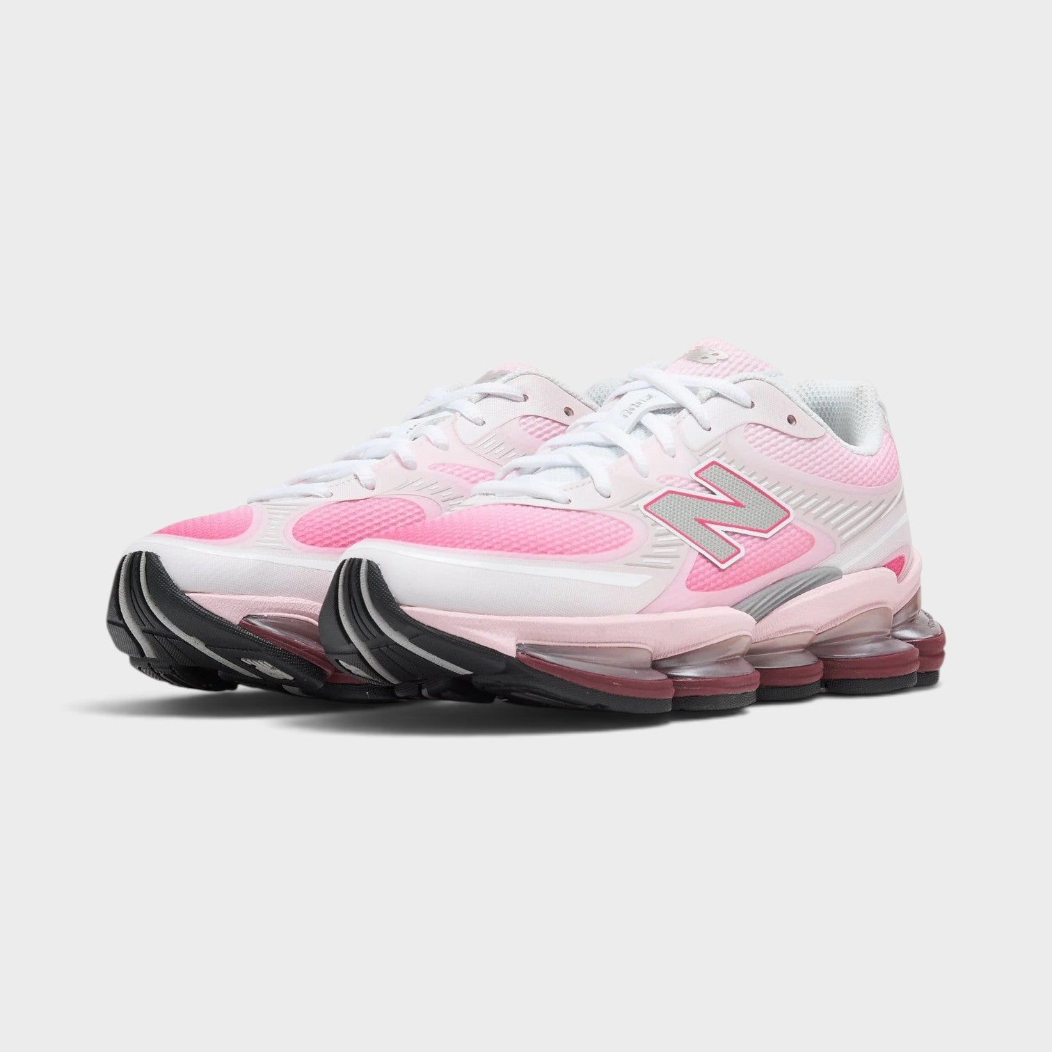 Supplied Fashion New Balance Abzorb 2000 sneakers in vibrant pink with mesh upper and cushioned midsole