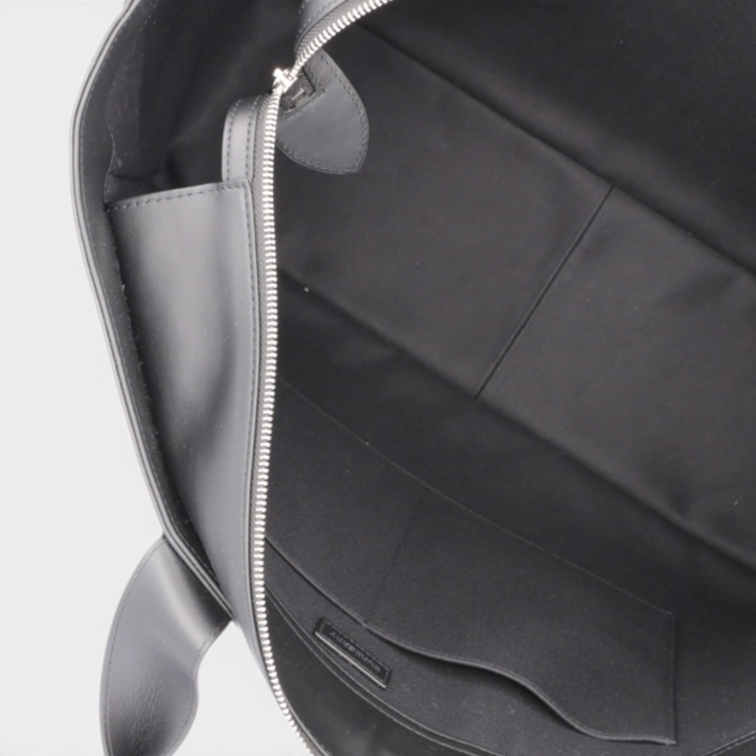 Supplied Fashion Burberry Ormond canvas and leather tote interior showing black fabric lining and zip pocket