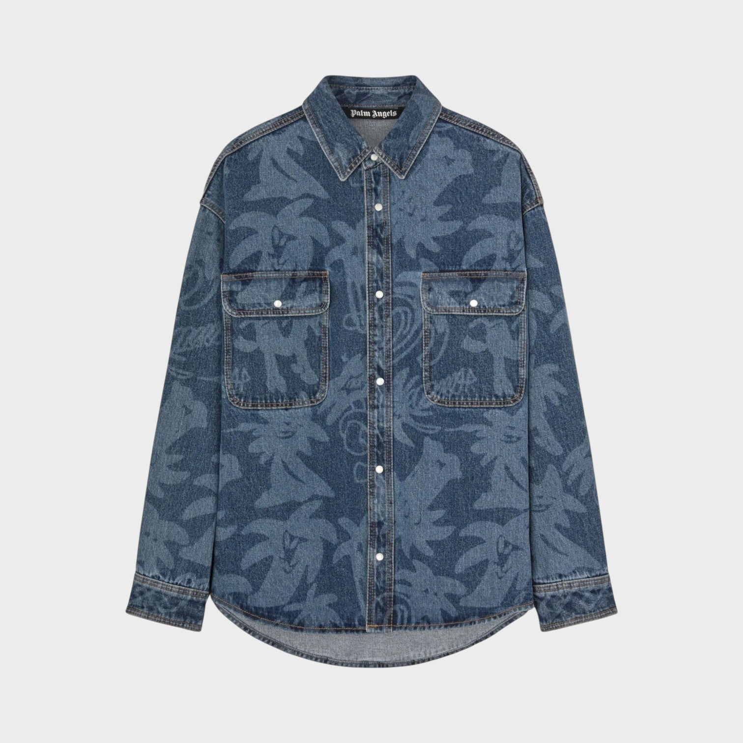 Supplied Fashion Palm Angels oversized blue denim shirt with laser-printed palm leaf pattern and dual chest pockets.