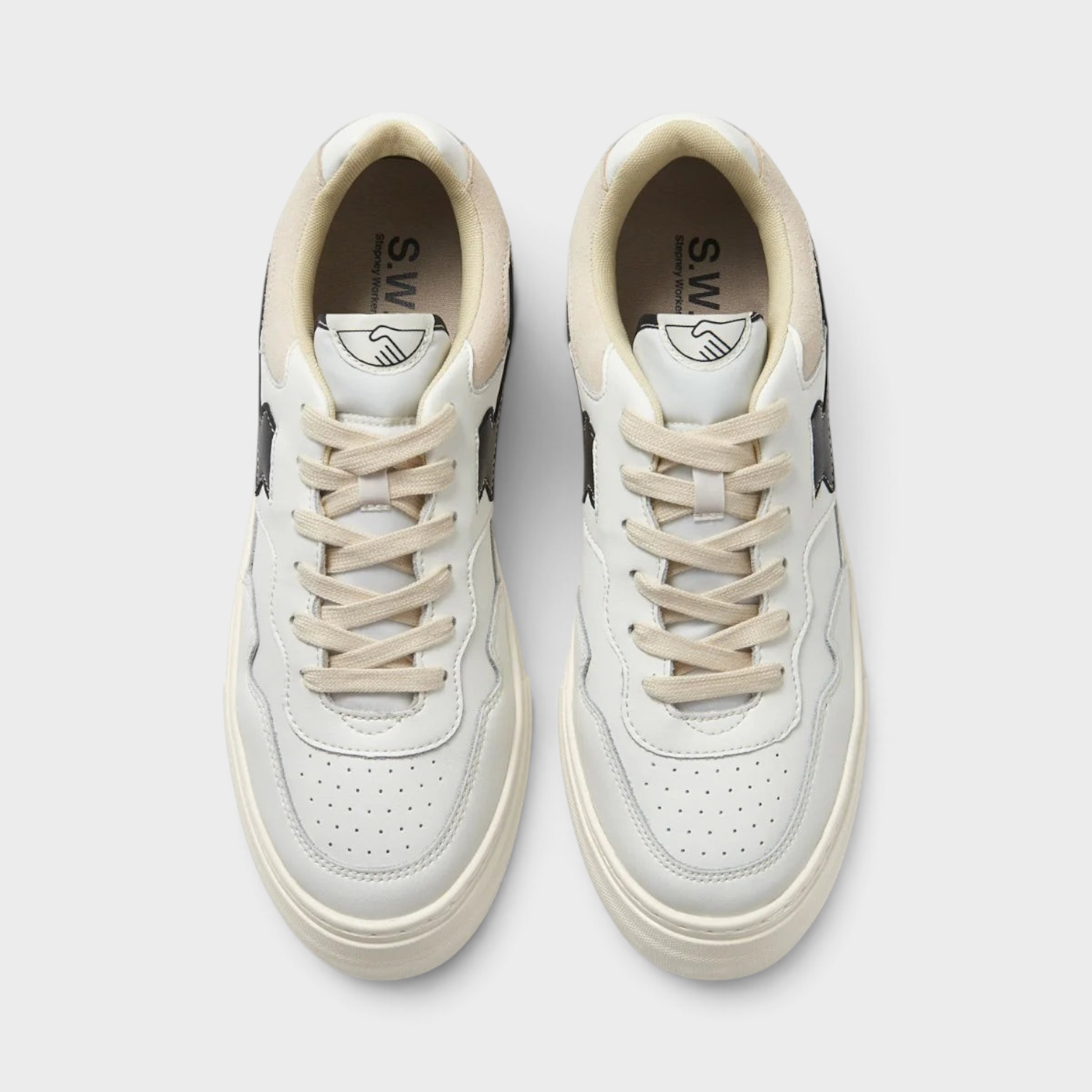 Supplied Fashion Pearl S-Strike leather sneakers in white and black with a minimalist design and lace-up closure.