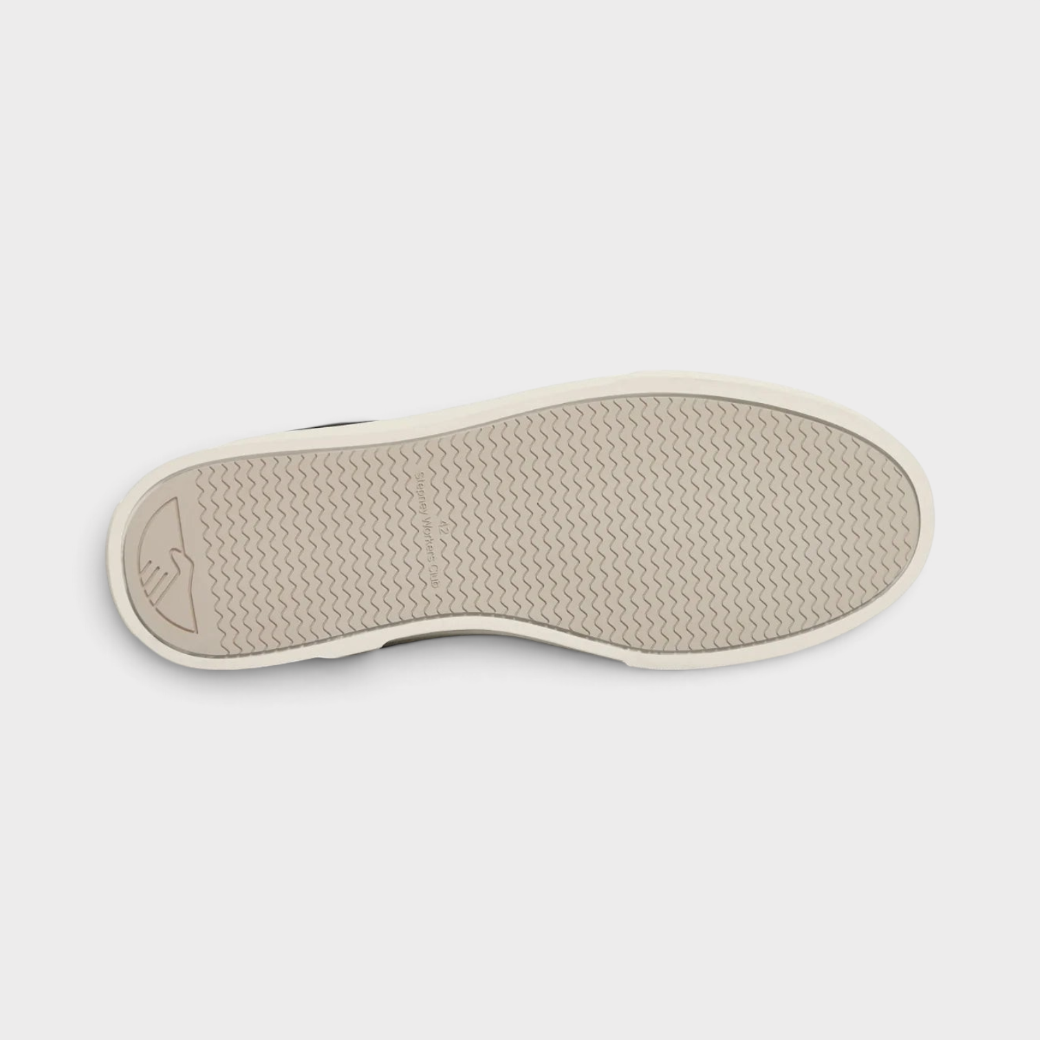 Supplied Fashion Pearl S-Strike sneaker showing the textured off-white rubber outsole with wave pattern grip
