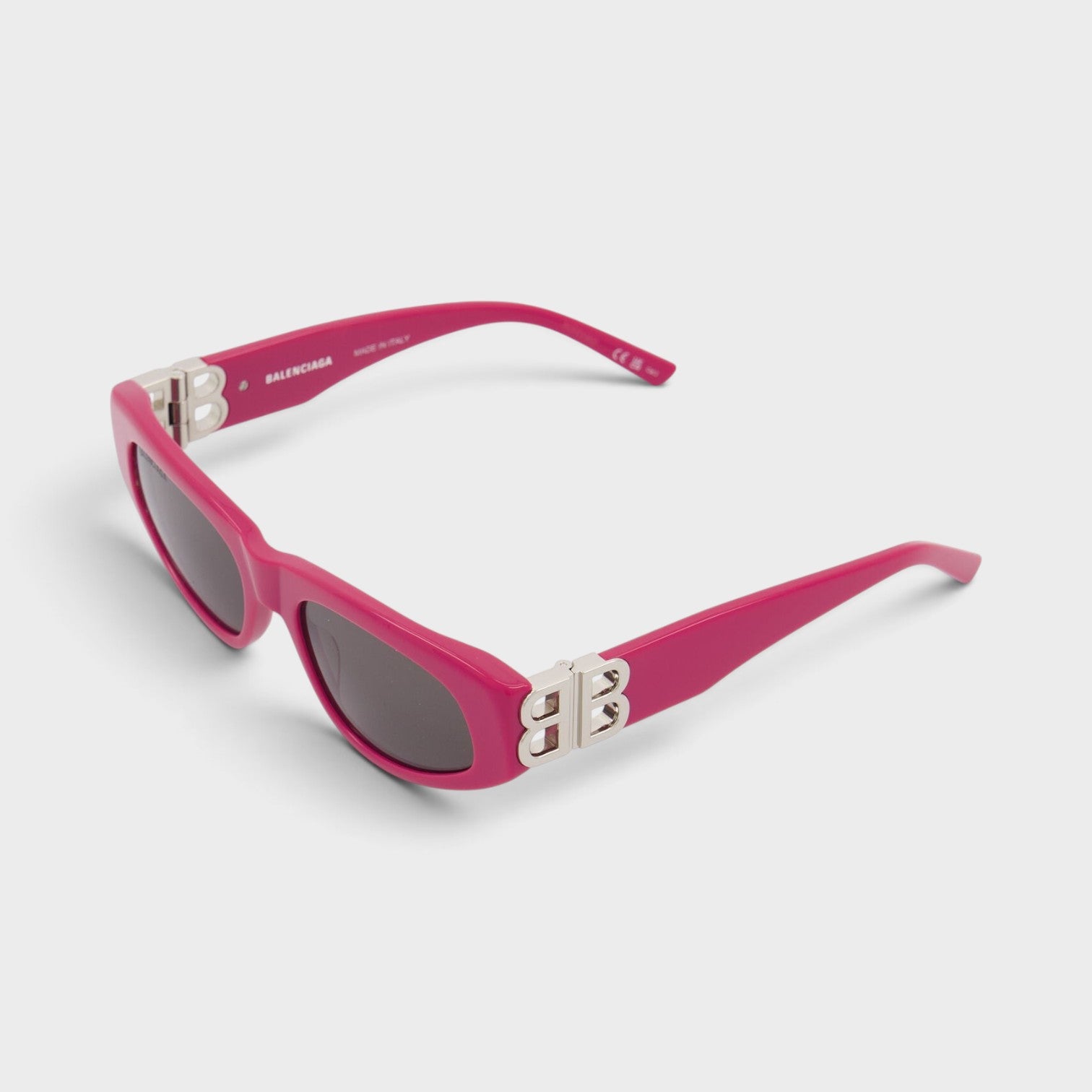 Supplied Fashion pink Balenciaga cat eye sunglasses with silver logo plaque on the temples