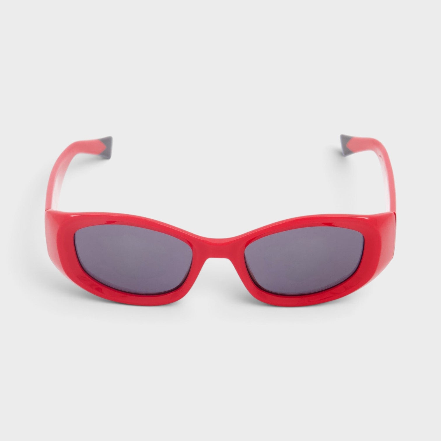 Supplied Fashion rectangular red sunglasses with dark tinted lenses and a bold designer frame.