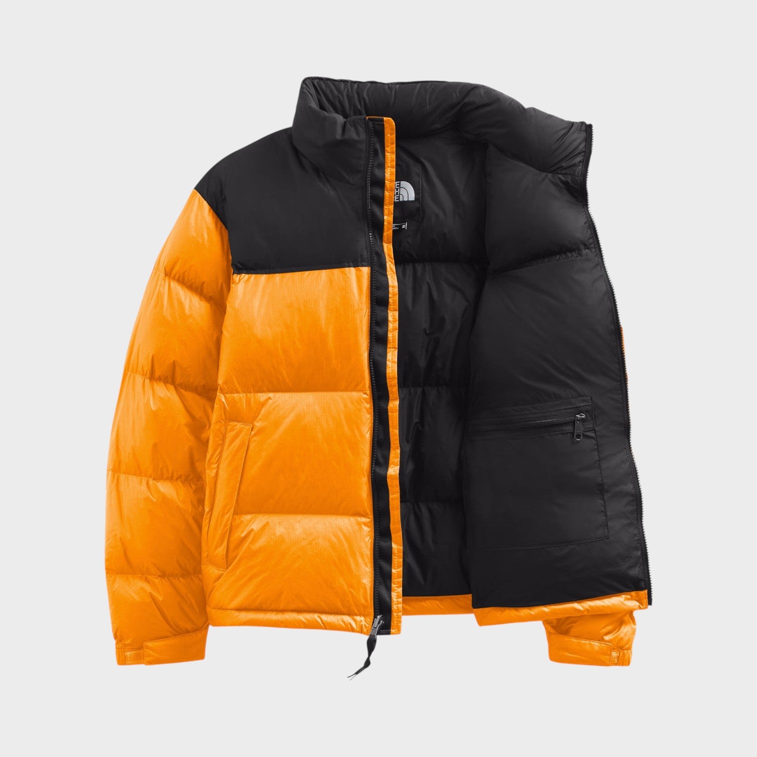 Supplied Fashion 1996 Retro Nuptse puffer jacket in summit gold yellow and black with an open front view.