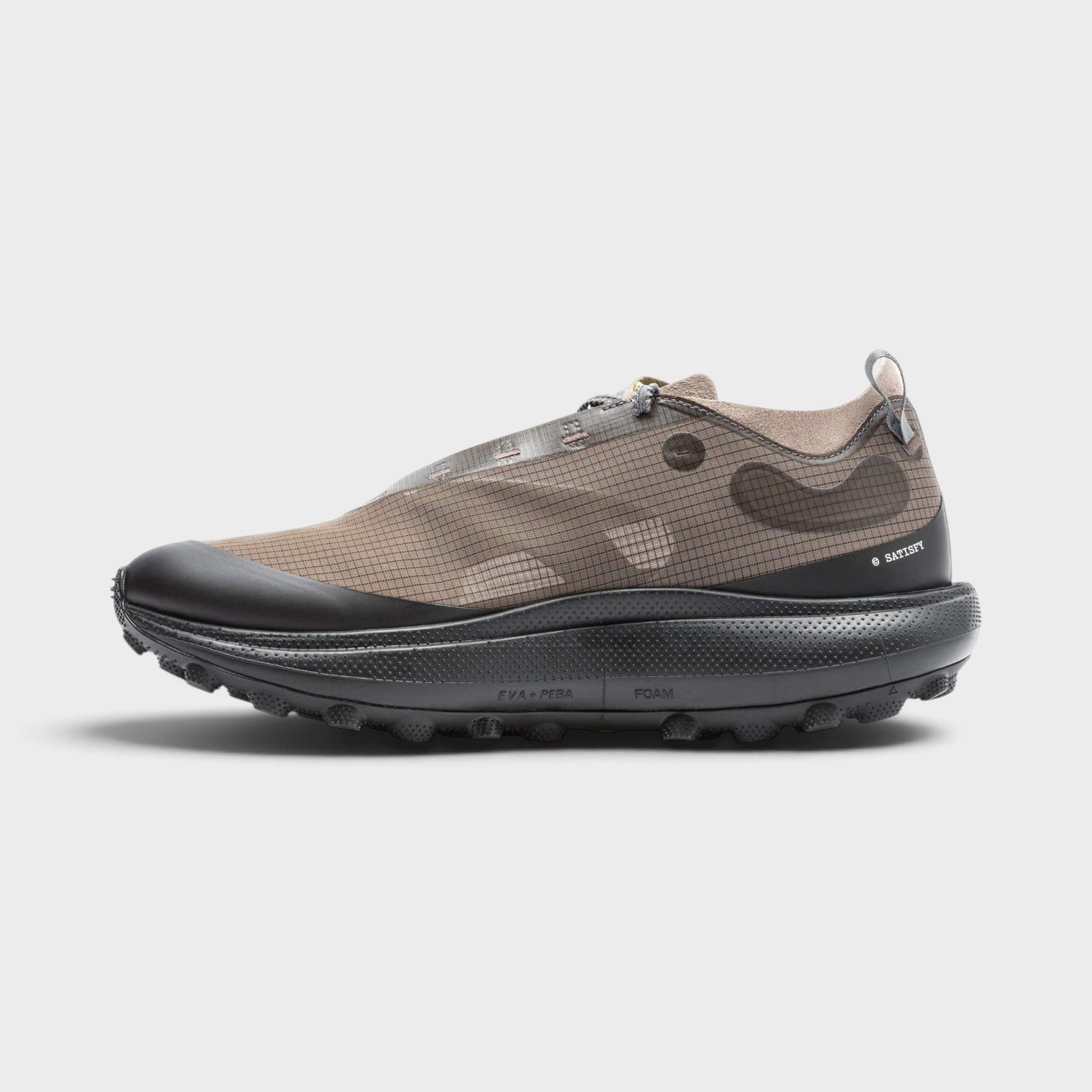 Supplied Fashion The Rocker sneakers in brown with a translucent grid upper, black mudguard, and thick foam sole.