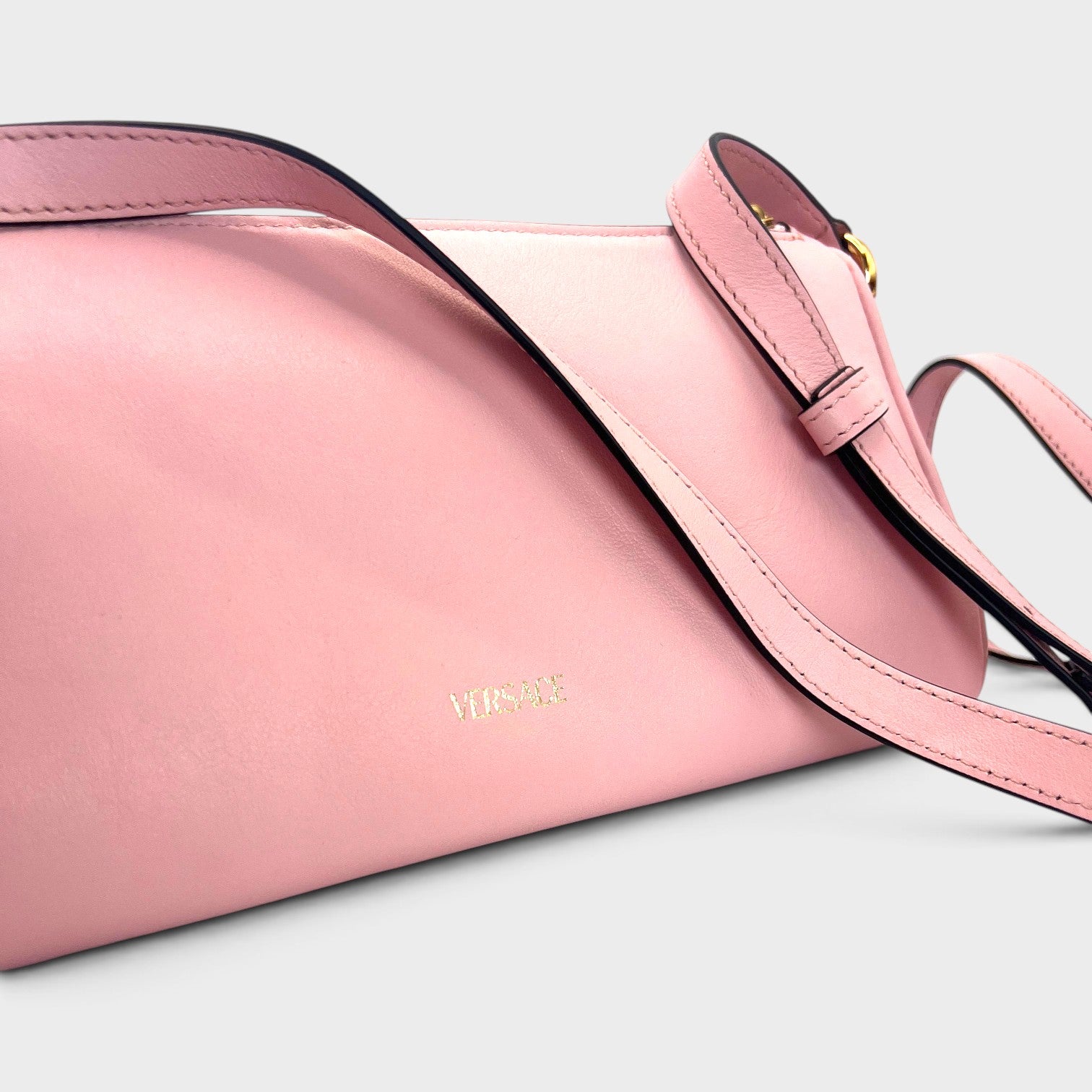 Supplied Fashion rose pink Versace Medusa crossbody bag with adjustable leather strap and gold logo detail
