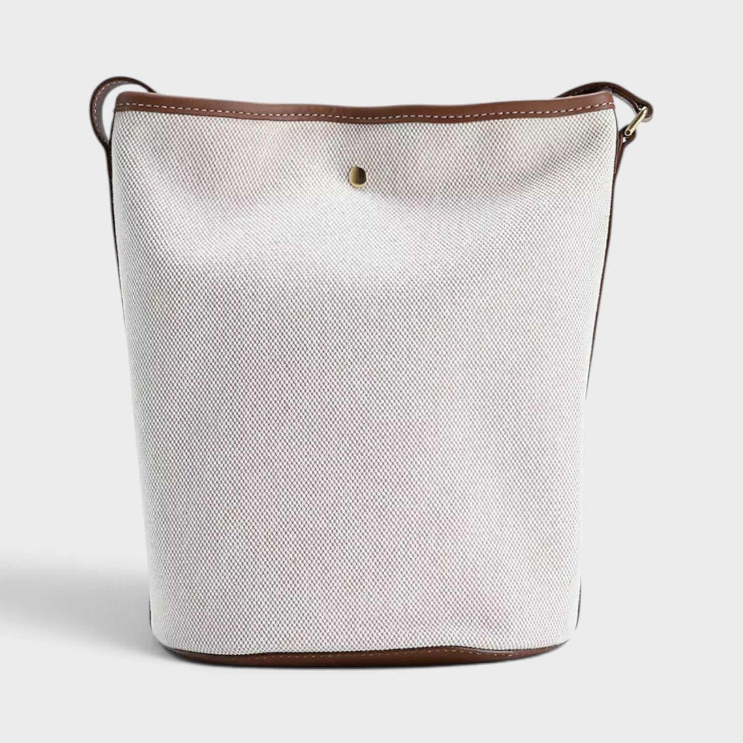 Supplied Fashion Roundel medium bucket bag in dark wheat beige canvas with brown leather trim and gold hardware.
