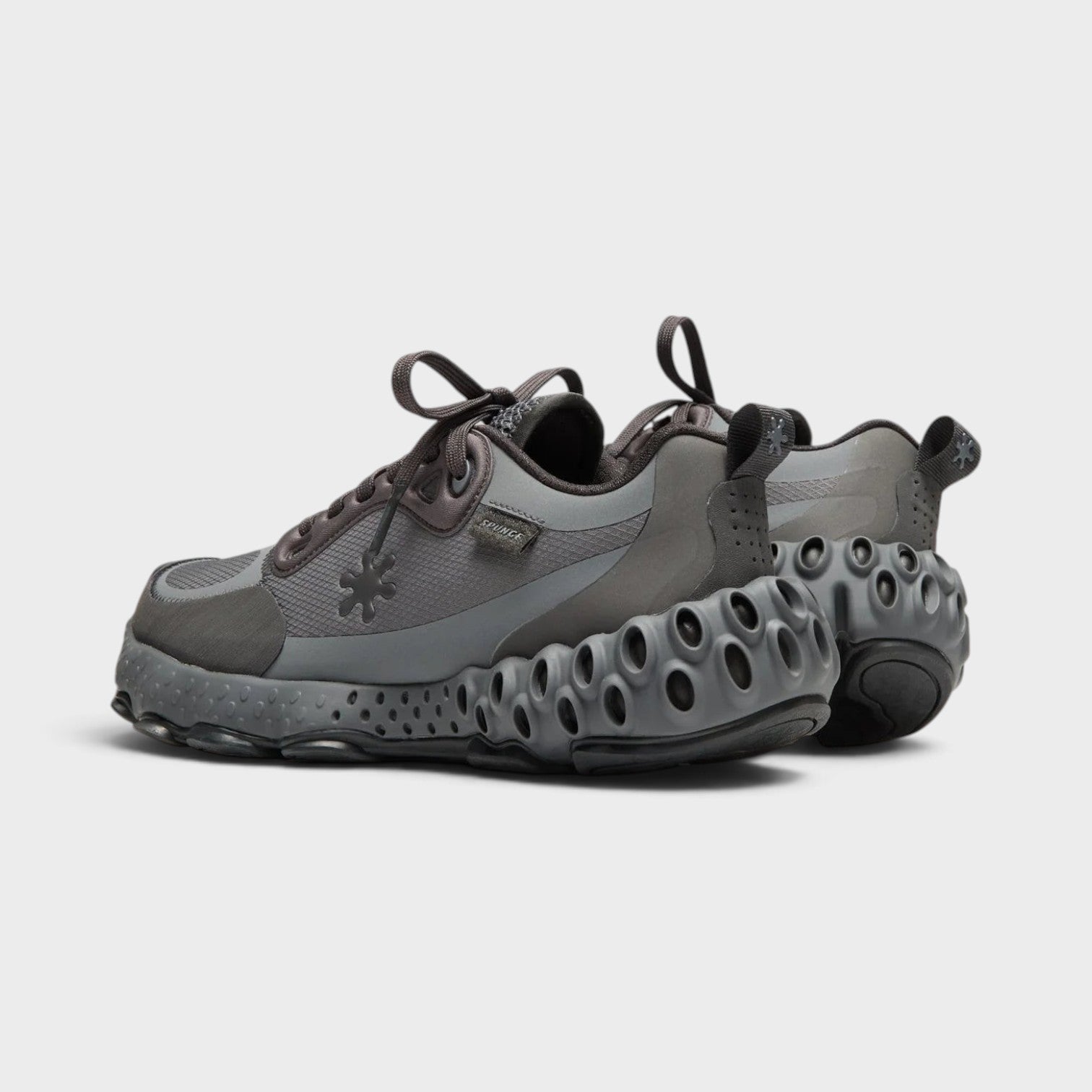 Supplied Fashion Salehe Bembury Osmosis sneakers in black and grey with signature spunge foam cushioning