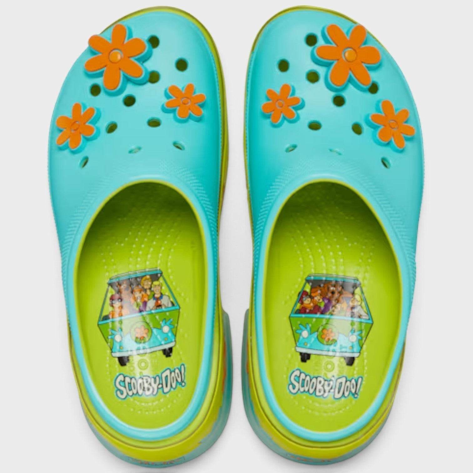 Supplied Fashion Scooby-Doo Siren platform clogs in lime punch with orange flower charms and Mystery Machine insoles.