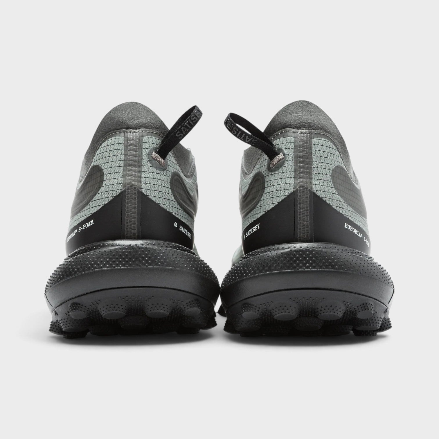 Supplied Fashion U The Rocker sneakers in shadow grey featuring a grid-patterned heel and textured black foam soles.