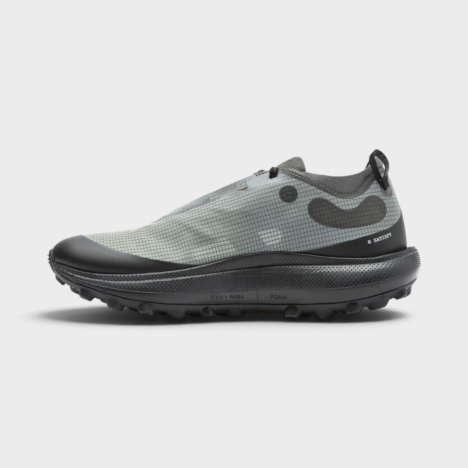 Supplied Fashion U The Rocker sneakers in shadow grey with a grid-patterned upper and thick black foam sole.