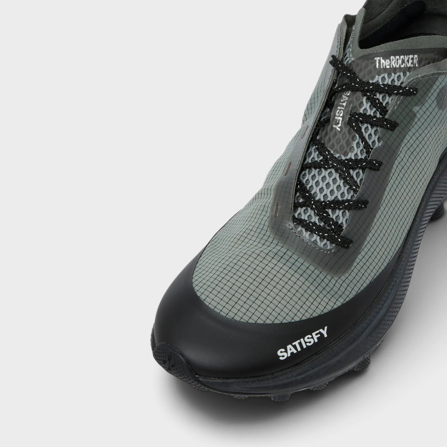 Supplied Fashion U The Rocker sneakers in shadow grey with a technical grid mesh upper and black rubber toe cap.