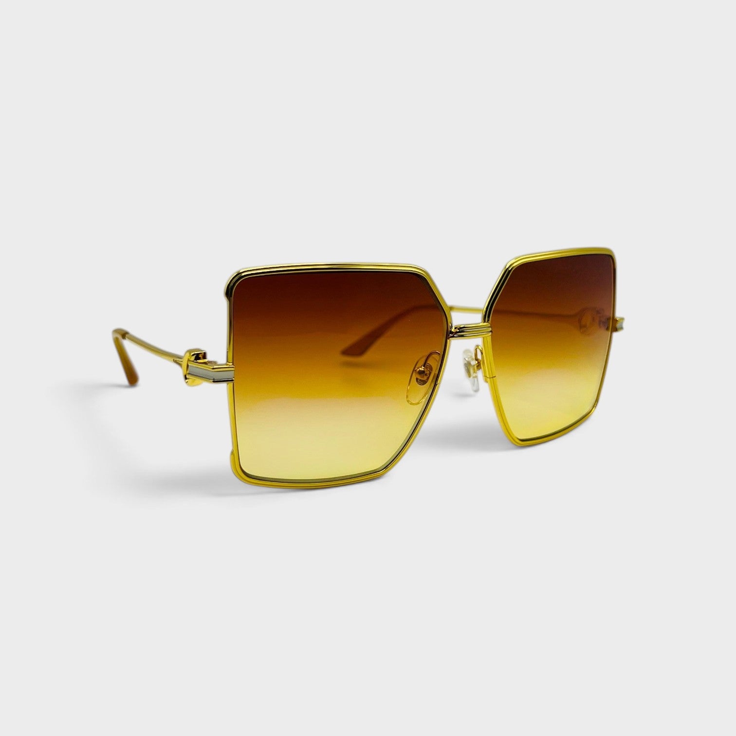 Supplied Fashion square stainless steel sunglasses with gold frames and orange sunset gradient lenses.
