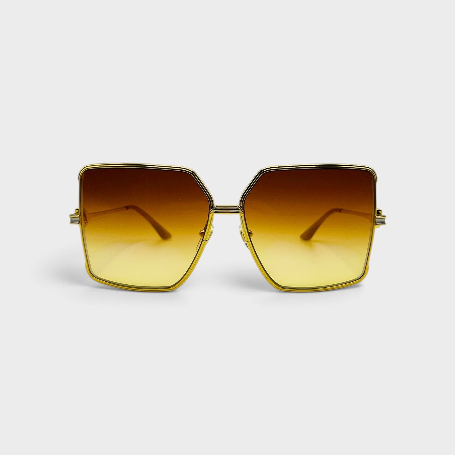 Supplied Fashion square stainless steel sunglasses with orange and yellow sunset gradient lenses and gold frames.