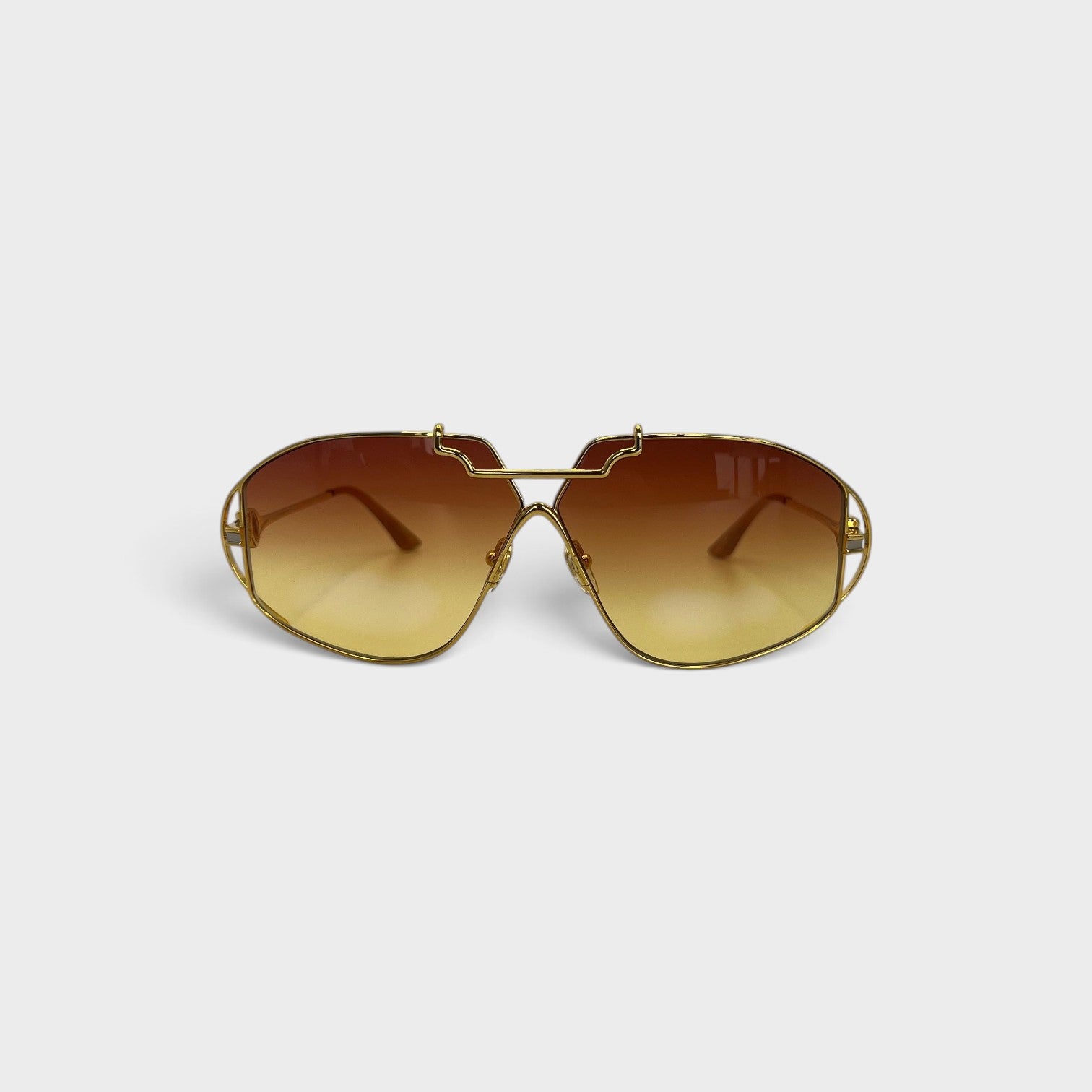 Supplied Fashion stainless steel aviator sunglasses with gold frames and brown gradient lenses on a white background.