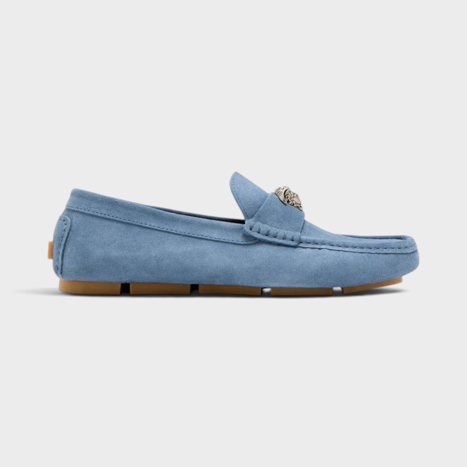 Supplied Fashion stone blue suede La Medusa driver loafers with silver metal emblem and brown rubber sole